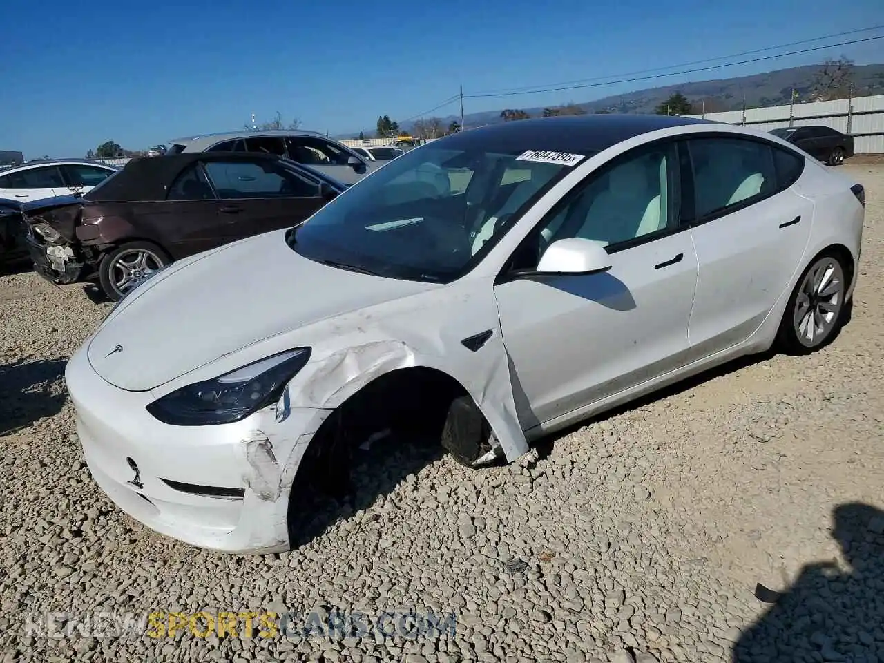 1 Photograph of a damaged car 5YJ3E1EB5NF321779 TESLA MODEL 3 2022