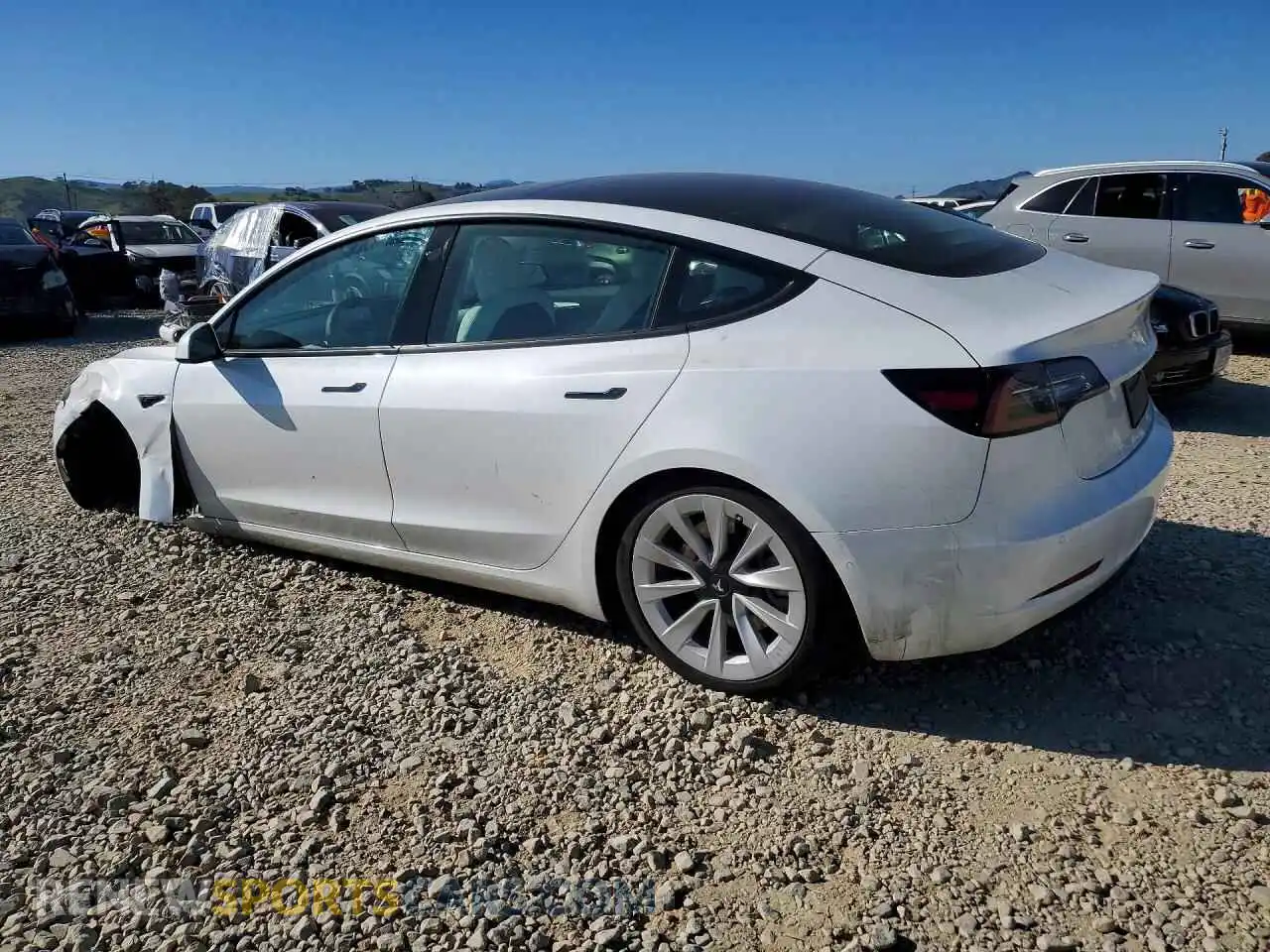 2 Photograph of a damaged car 5YJ3E1EB5NF321779 TESLA MODEL 3 2022