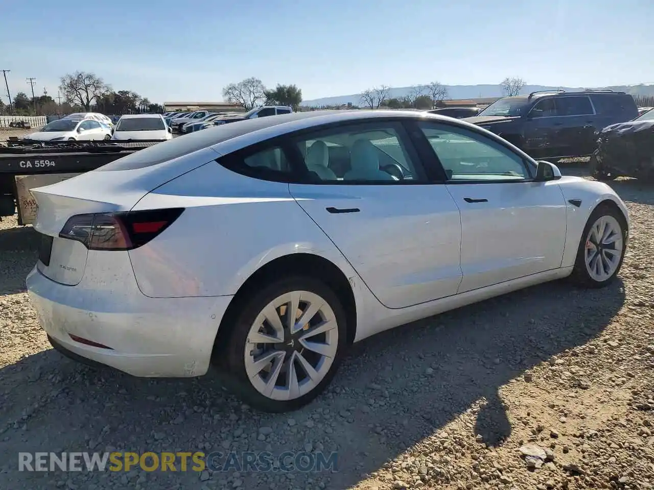 3 Photograph of a damaged car 5YJ3E1EB5NF321779 TESLA MODEL 3 2022