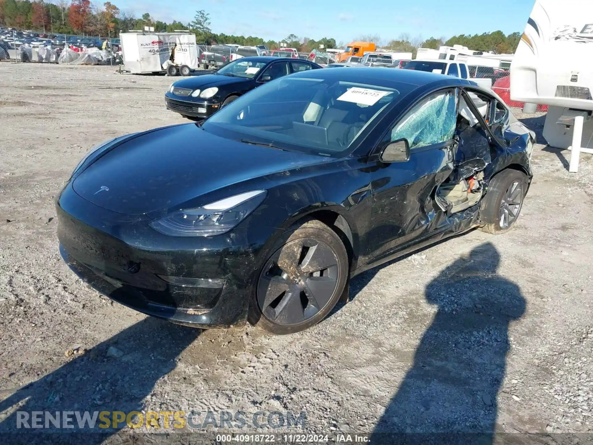2 fotografías del automóvil dañado 5YJ3E1EB5NF331549 TESLA MODEL 3 2022