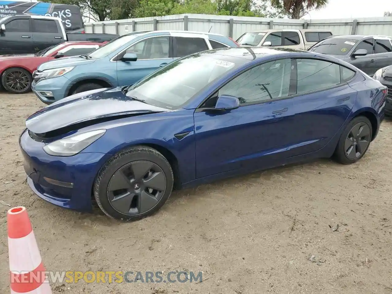1 Photograph of a damaged car 5YJ3E1EB5NF334399 TESLA MODEL 3 2022