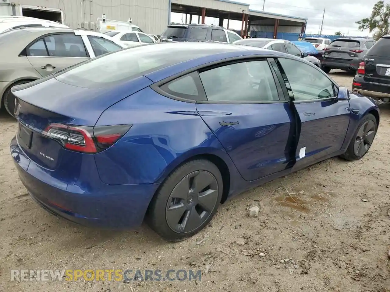 3 Photograph of a damaged car 5YJ3E1EB5NF334399 TESLA MODEL 3 2022
