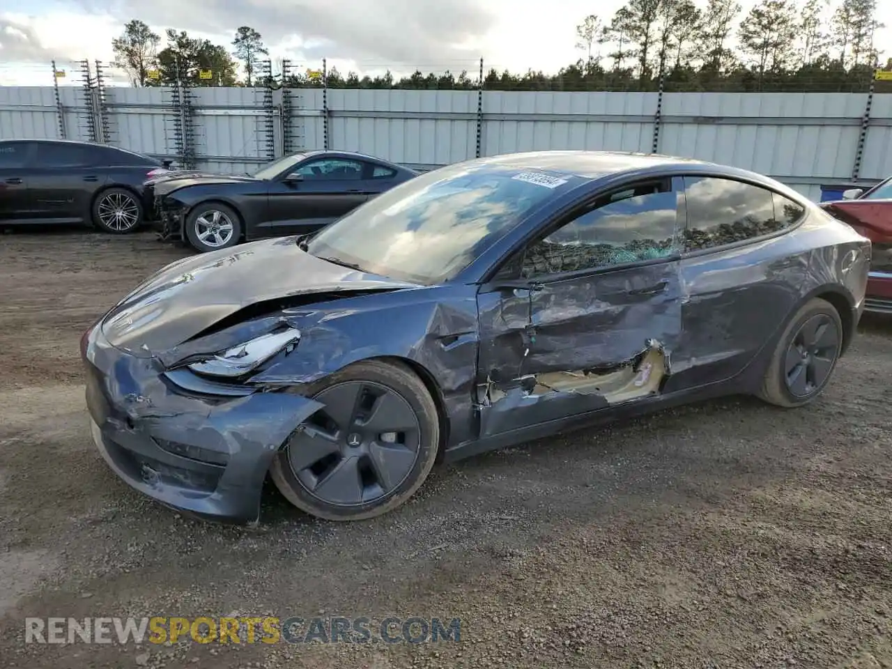 1 Photograph of a damaged car 5YJ3E1EB5NF341143 TESLA MODEL 3 2022