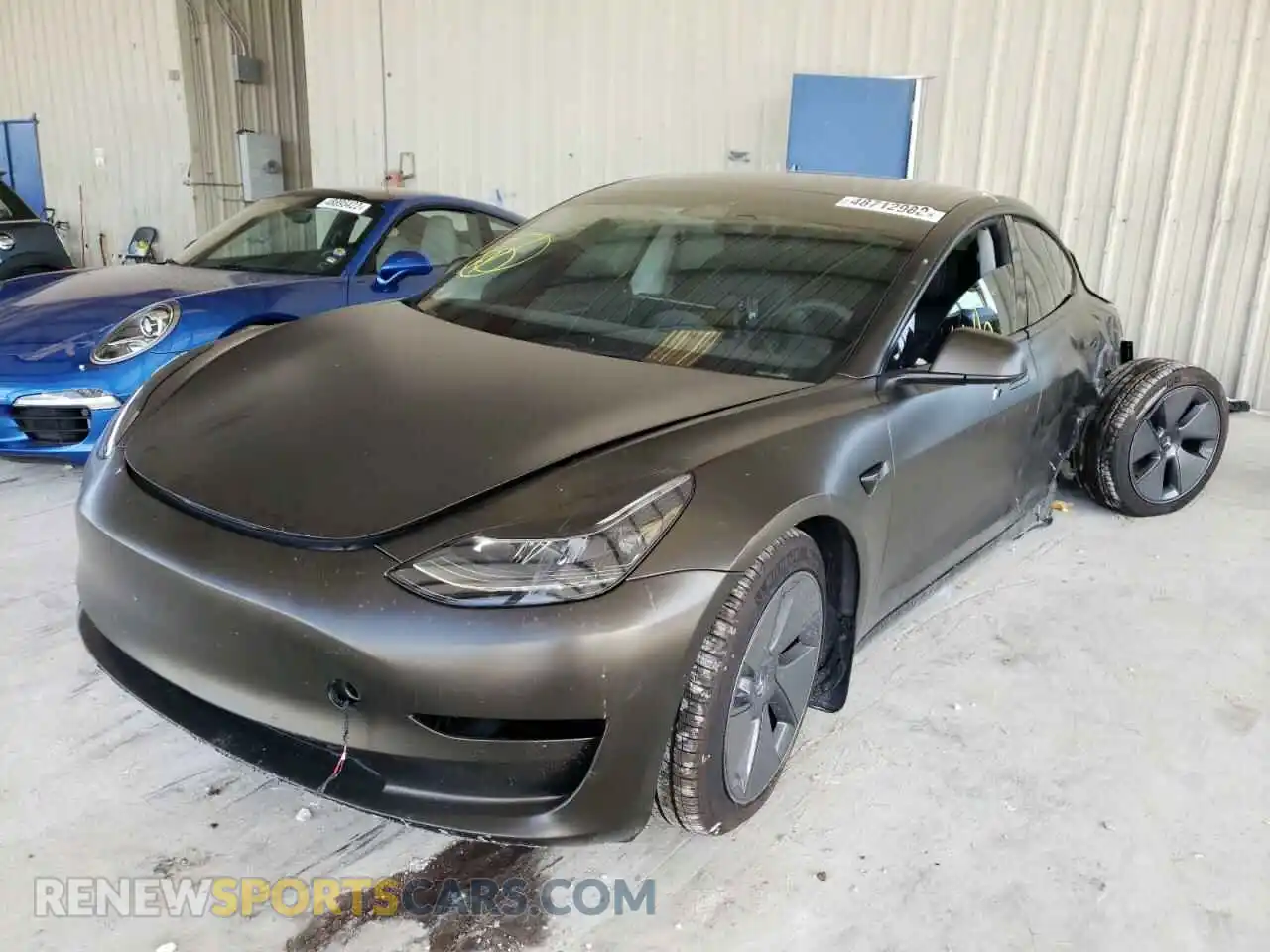2 fotografías del automóvil dañado 5YJ3E1EB6NF104614 TESLA MODEL 3 2022