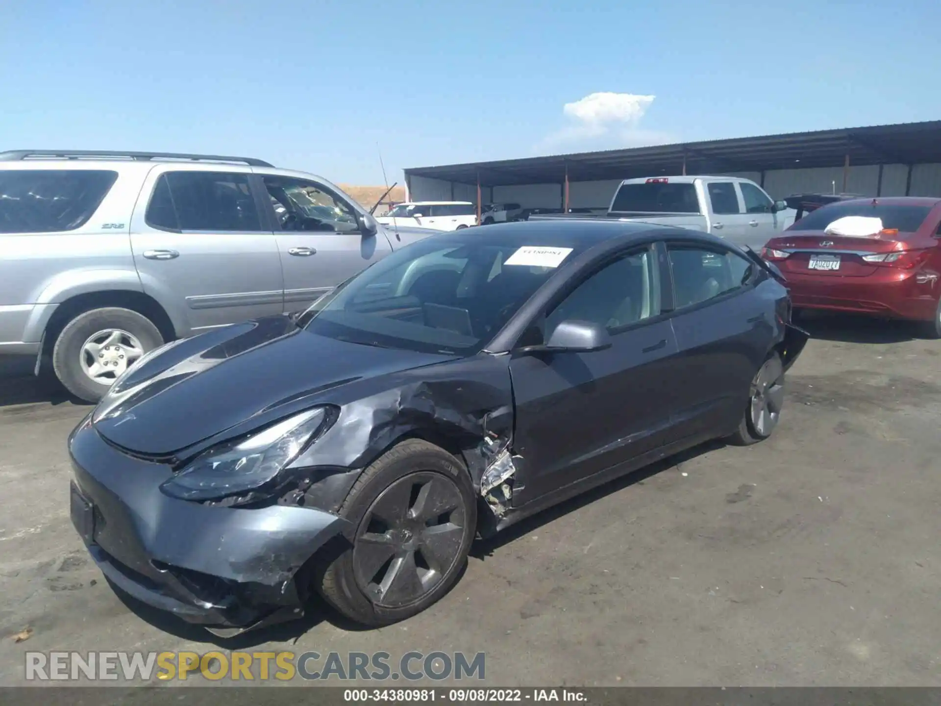 2 Photograph of a damaged car 5YJ3E1EB6NF126130 TESLA MODEL 3 2022