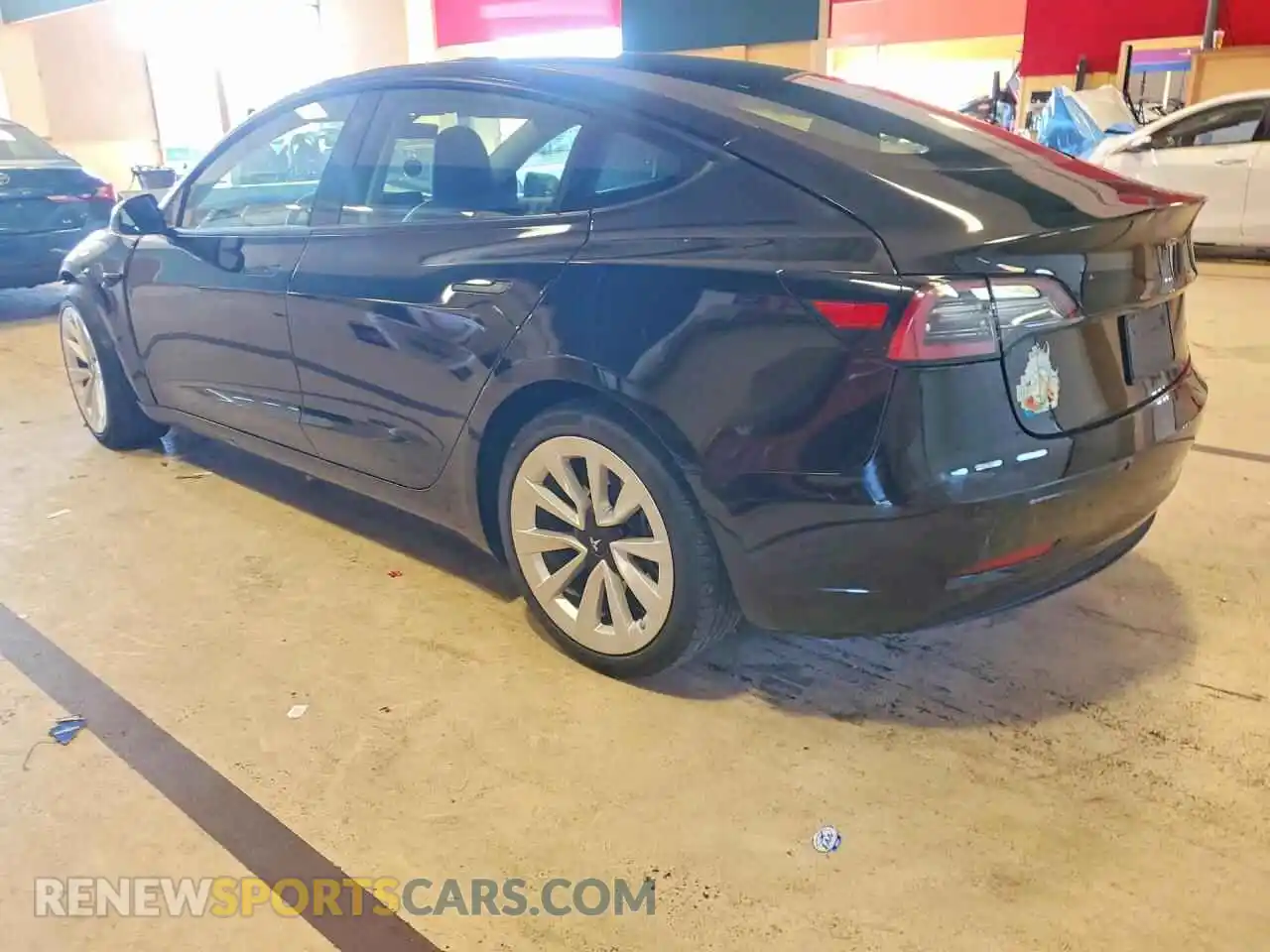 2 Photograph of a damaged car 5YJ3E1EB6NF129884 TESLA MODEL 3 2022