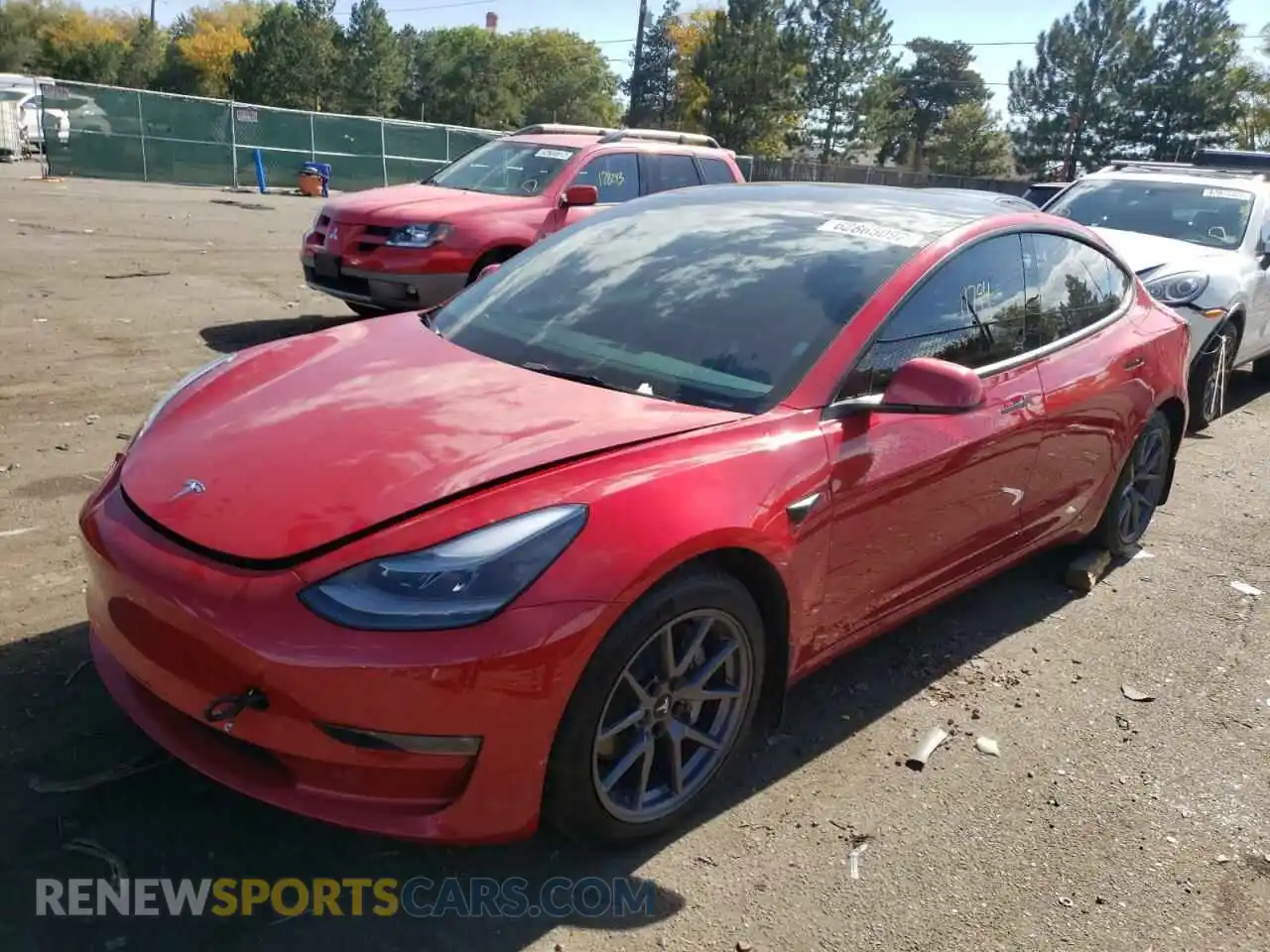 2 Photograph of a damaged car 5YJ3E1EB6NF173559 TESLA MODEL 3 2022