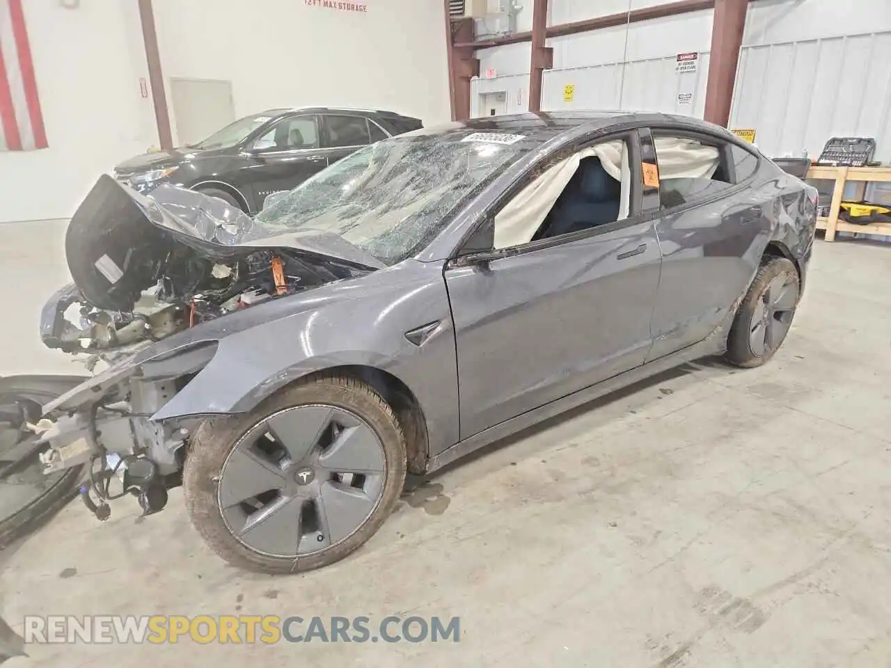 1 Photograph of a damaged car 5YJ3E1EB6NF174615 TESLA MODEL 3 2022