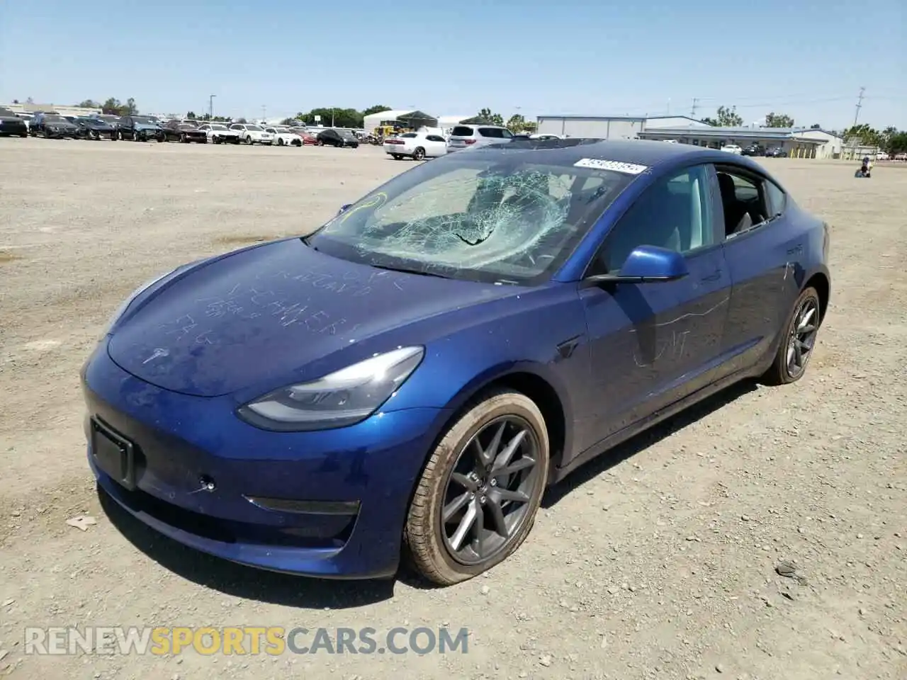 2 fotografías del automóvil dañado 5YJ3E1EB6NF187851 TESLA MODEL 3 2022
