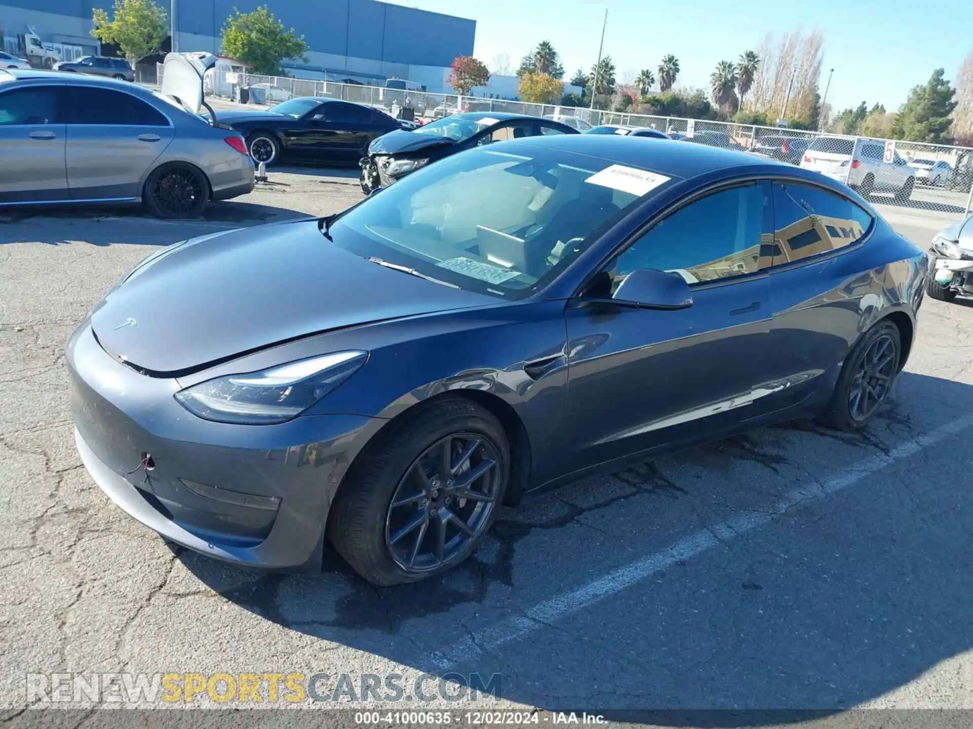 2 Photograph of a damaged car 5YJ3E1EB6NF240418 TESLA MODEL 3 2022