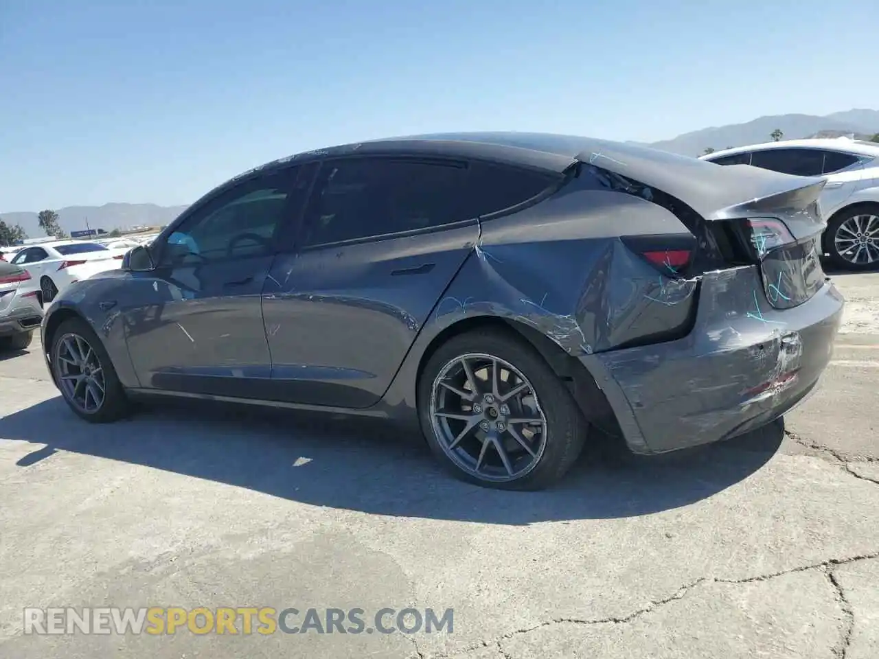 2 Photograph of a damaged car 5YJ3E1EB6NF240886 TESLA MODEL 3 2022