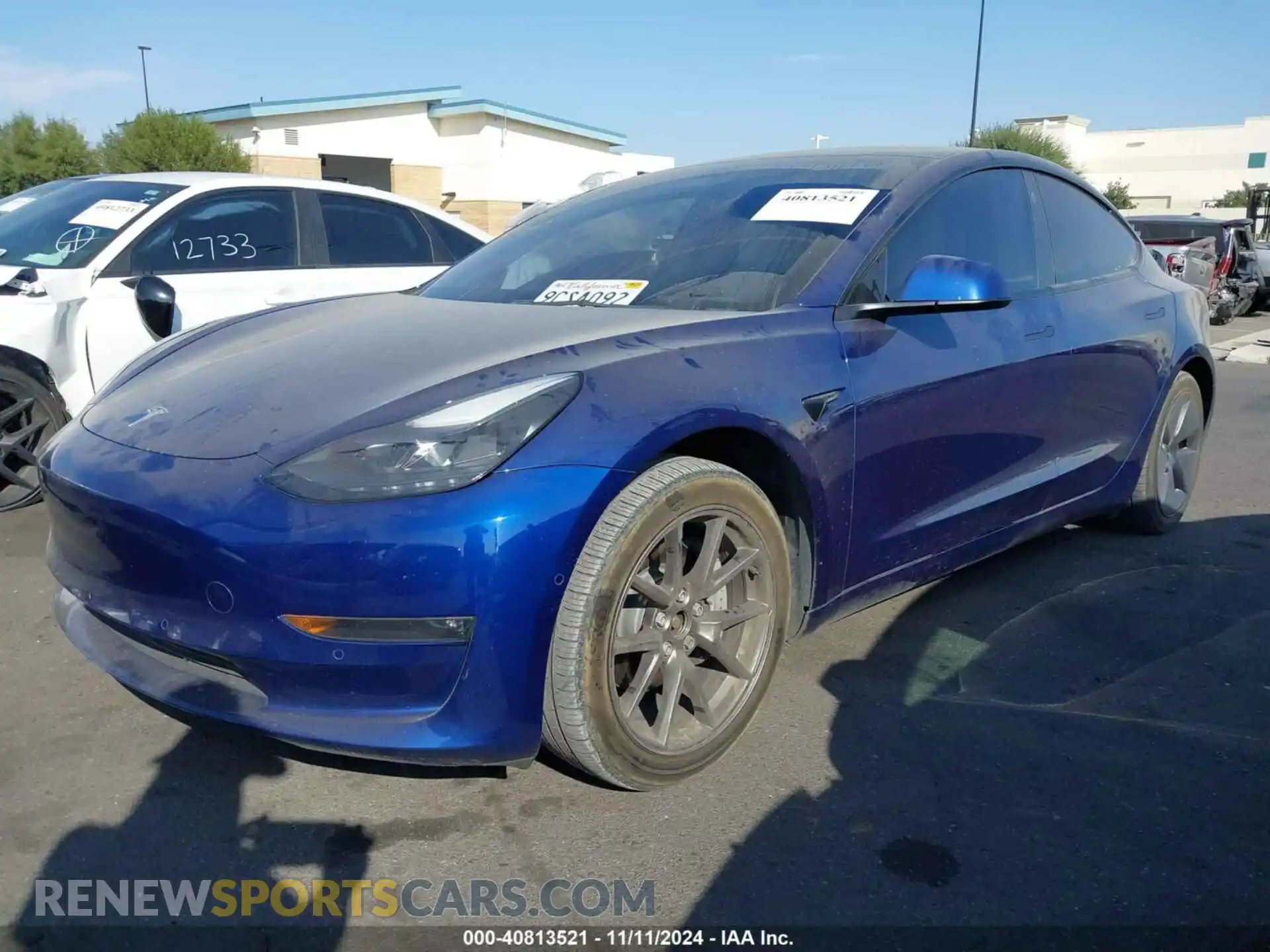 2 Photograph of a damaged car 5YJ3E1EB6NF325811 TESLA MODEL 3 2022
