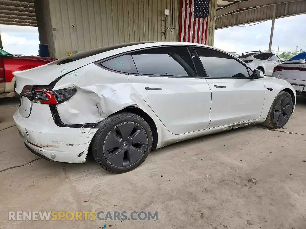 3 Photograph of a damaged car 5YJ3E1EB6NF334072 TESLA MODEL 3 2022