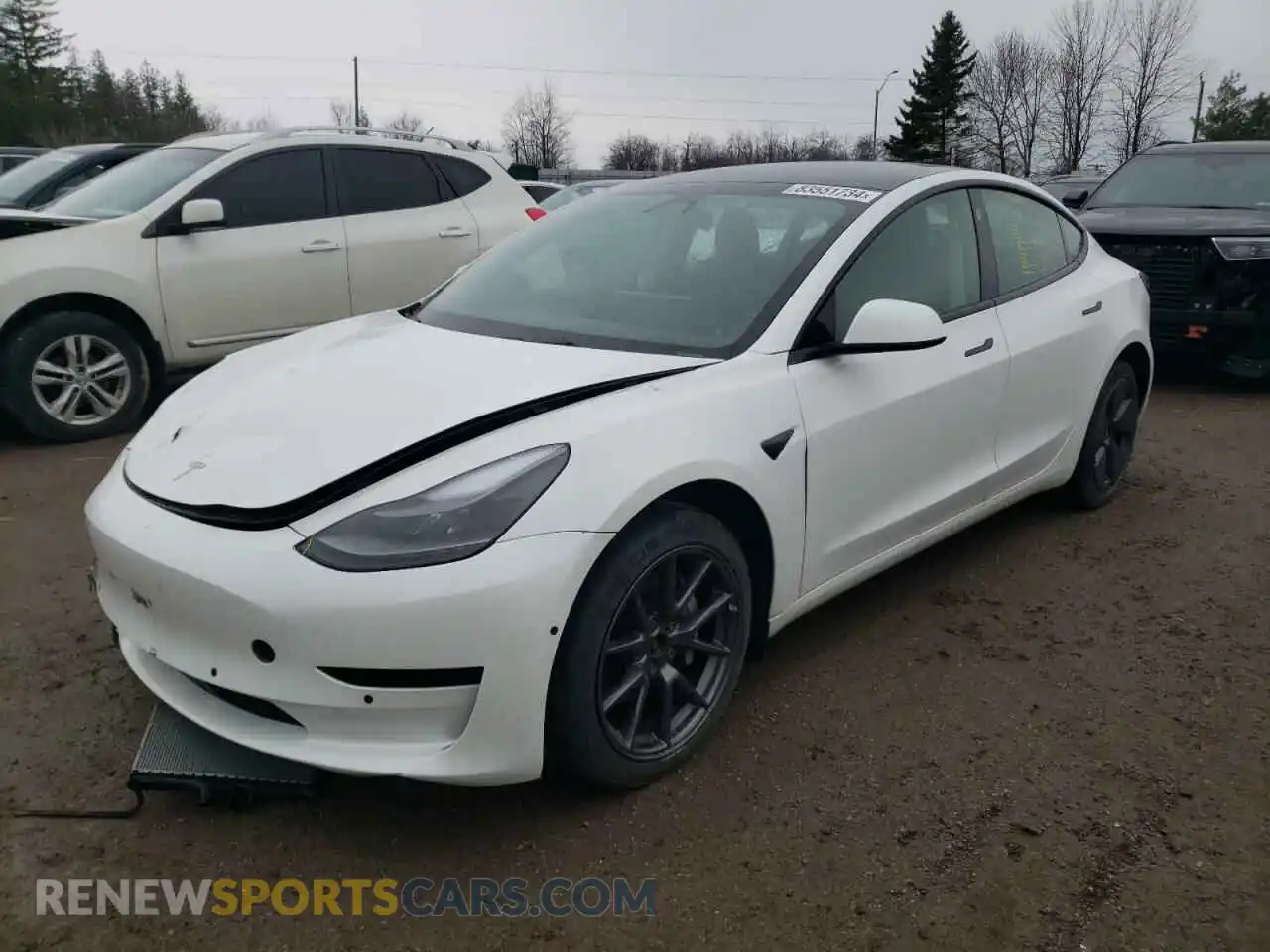 1 Photograph of a damaged car 5YJ3E1EB7NF108087 TESLA MODEL 3 2022