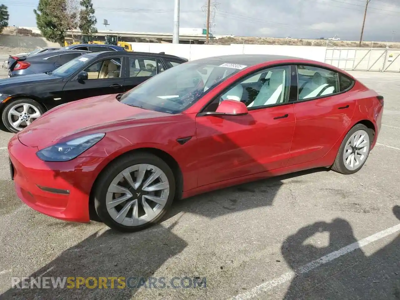1 Photograph of a damaged car 5YJ3E1EB7NF120885 TESLA MODEL 3 2022