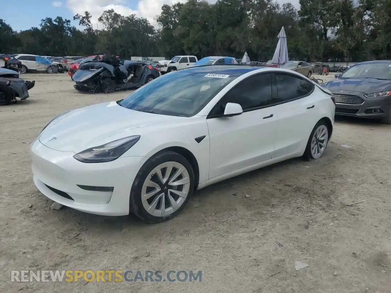 1 Photograph of a damaged car 5YJ3E1EB7NF205645 TESLA MODEL 3 2022
