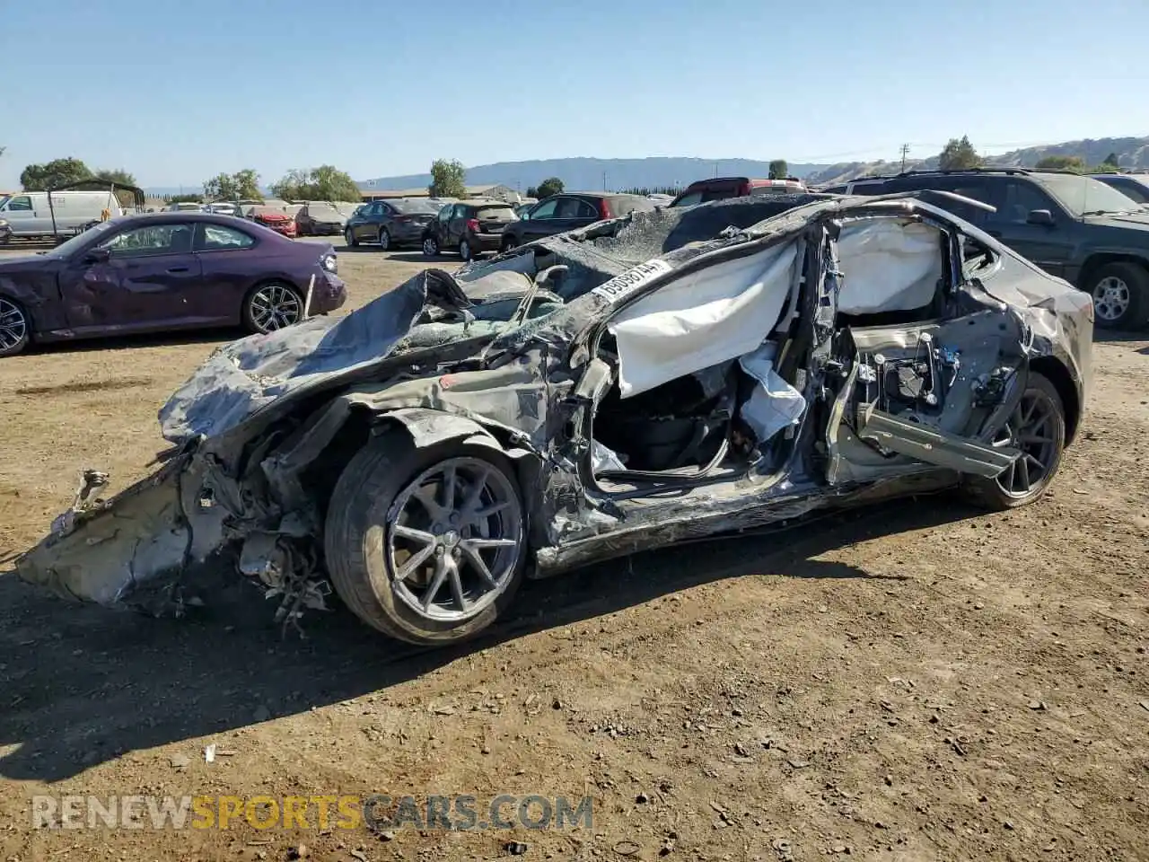 1 Photograph of a damaged car 5YJ3E1EB7NF205712 TESLA MODEL 3 2022
