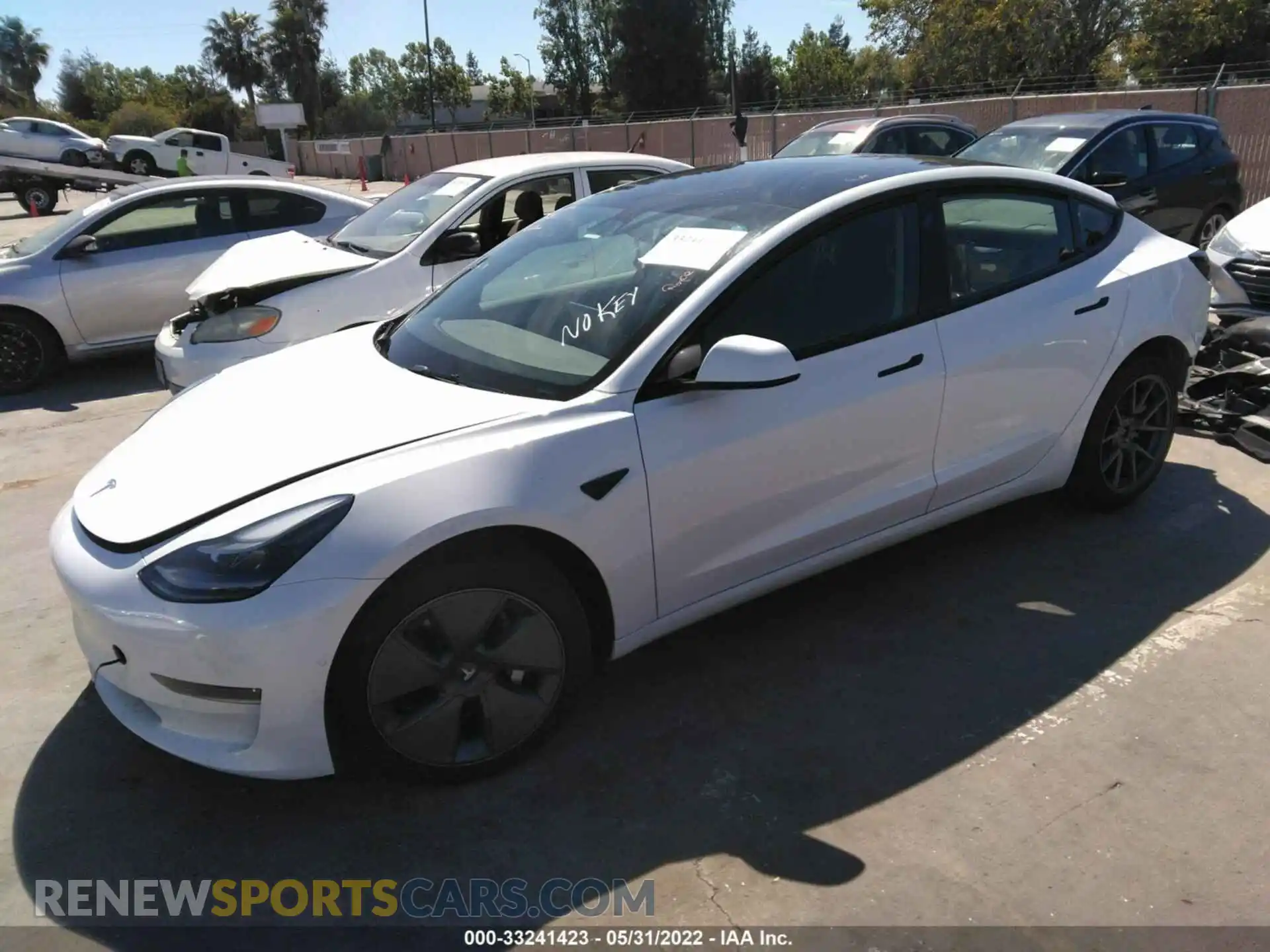 2 fotografías del automóvil dañado 5YJ3E1EB7NF213132 TESLA MODEL 3 2022