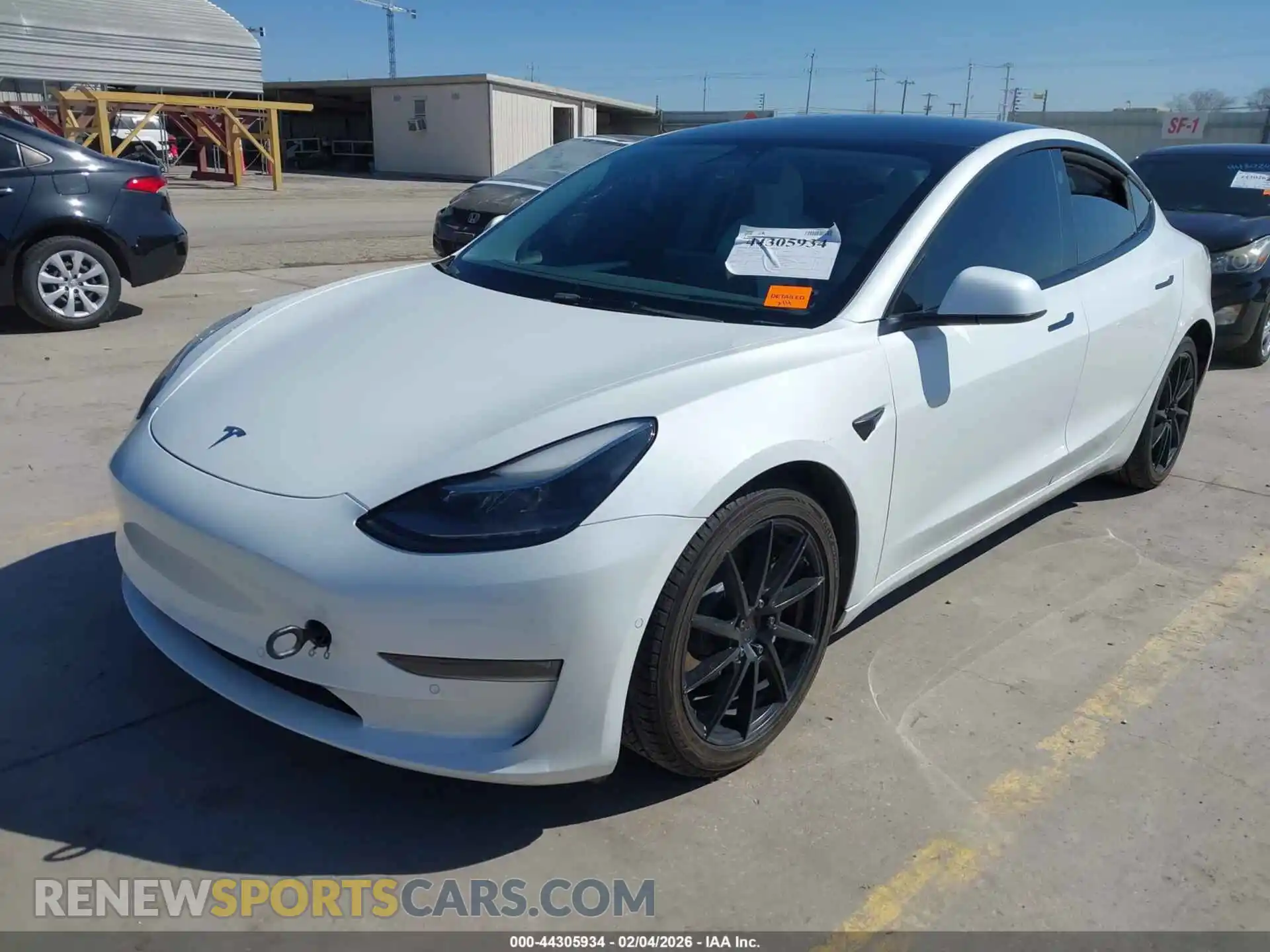 2 Photograph of a damaged car 5YJ3E1EB7NF230450 TESLA MODEL 3 2022