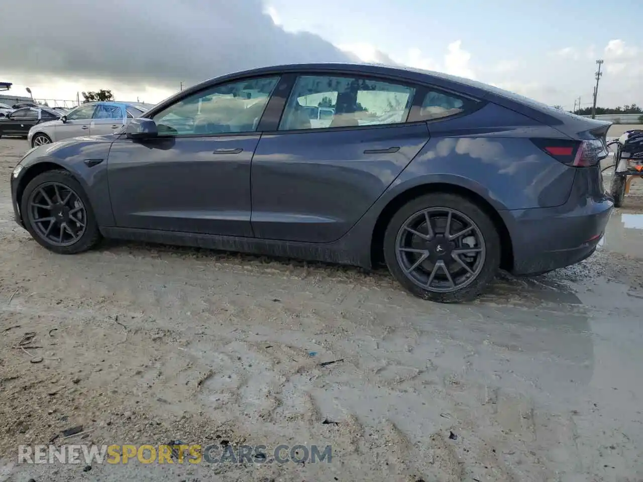 2 fotografías del automóvil dañado 5YJ3E1EB7NF233574 TESLA MODEL 3 2022