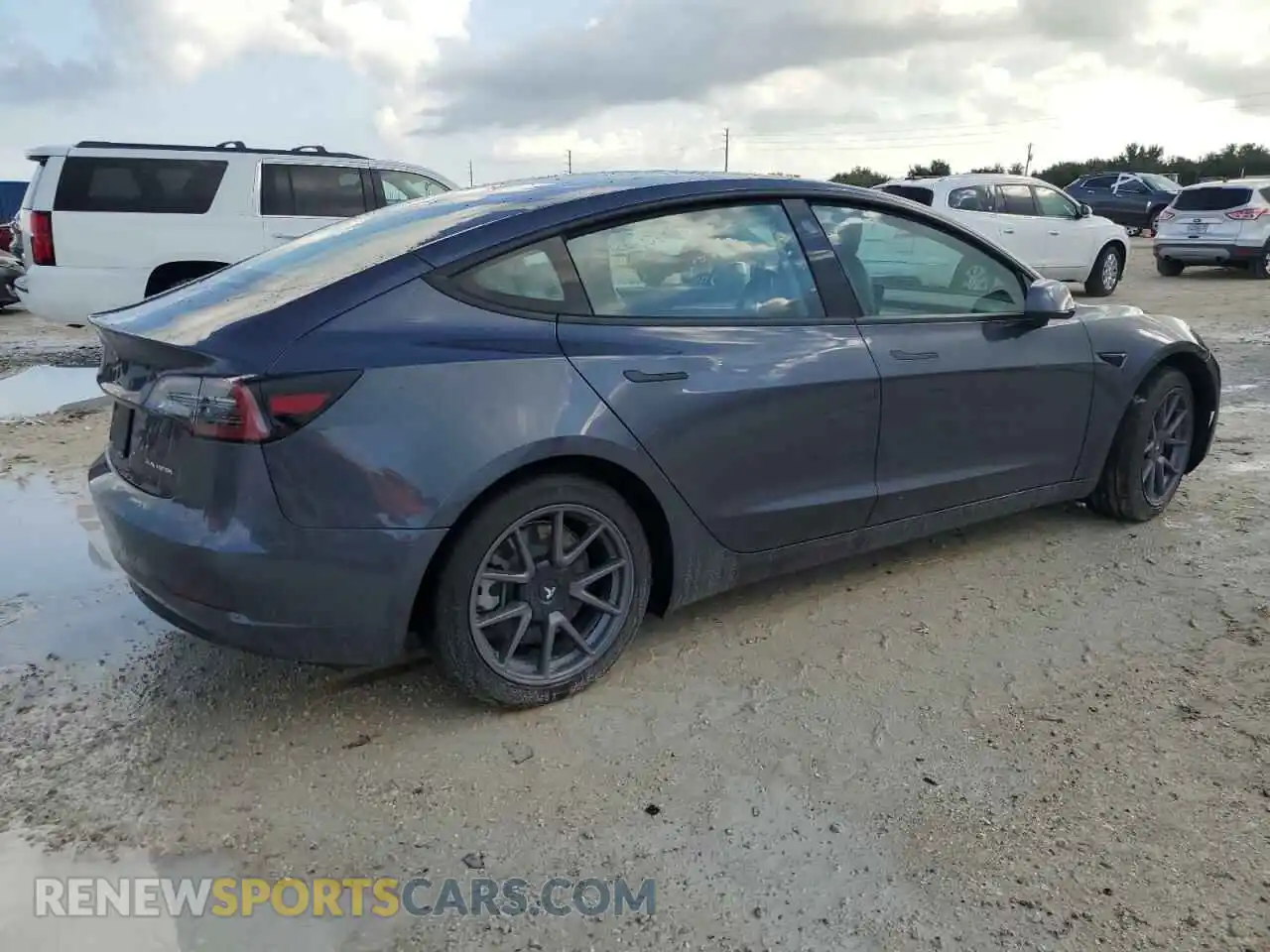 3 fotografías del automóvil dañado 5YJ3E1EB7NF233574 TESLA MODEL 3 2022