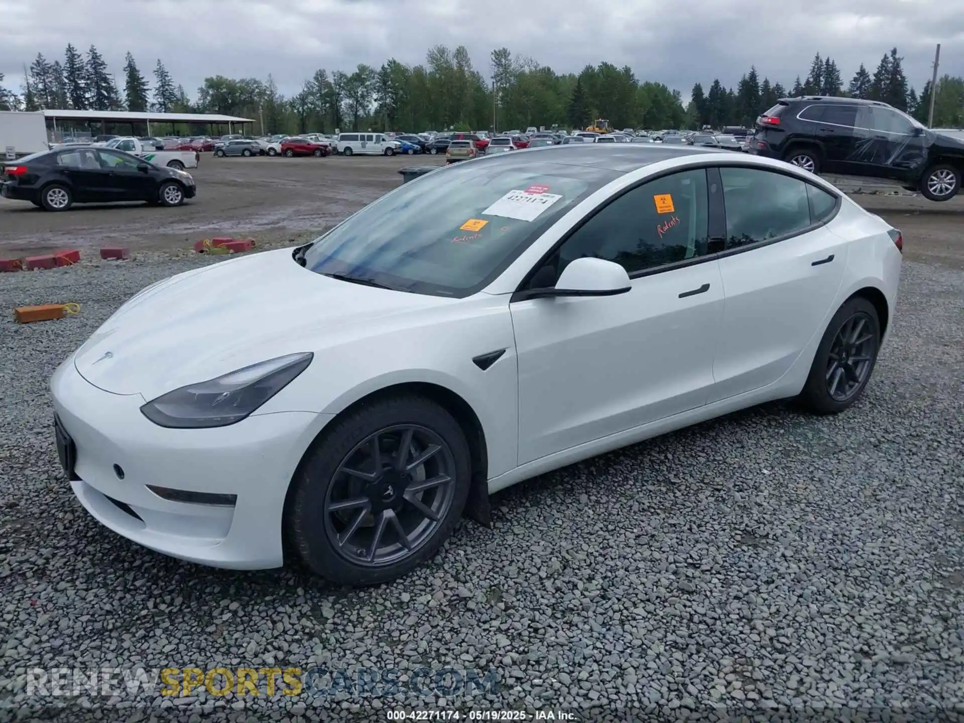 2 Photograph of a damaged car 5YJ3E1EB7NF256997 TESLA MODEL 3 2022