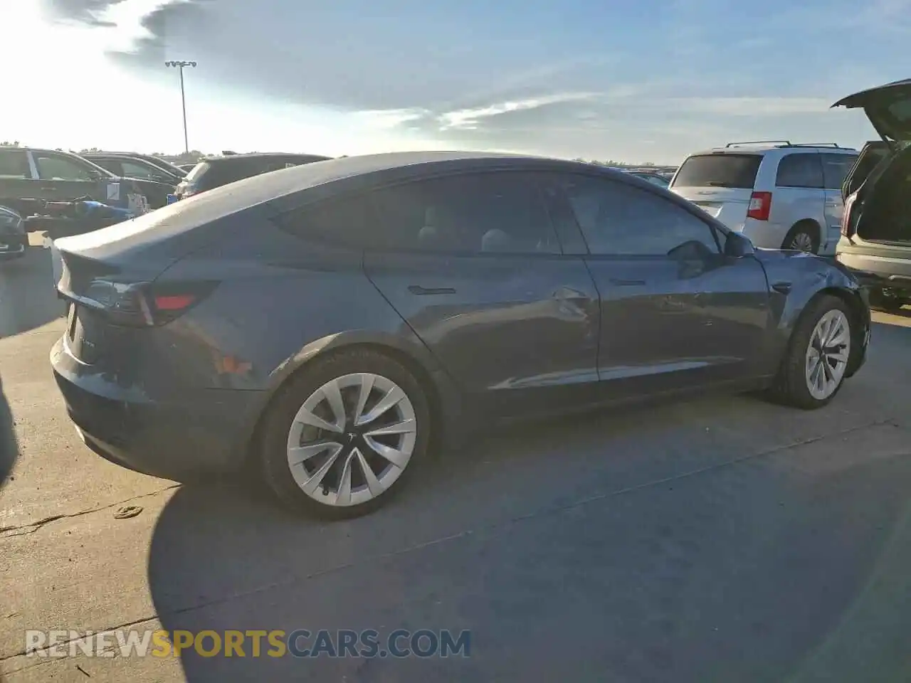 3 Photograph of a damaged car 5YJ3E1EB7NF258586 TESLA MODEL 3 2022