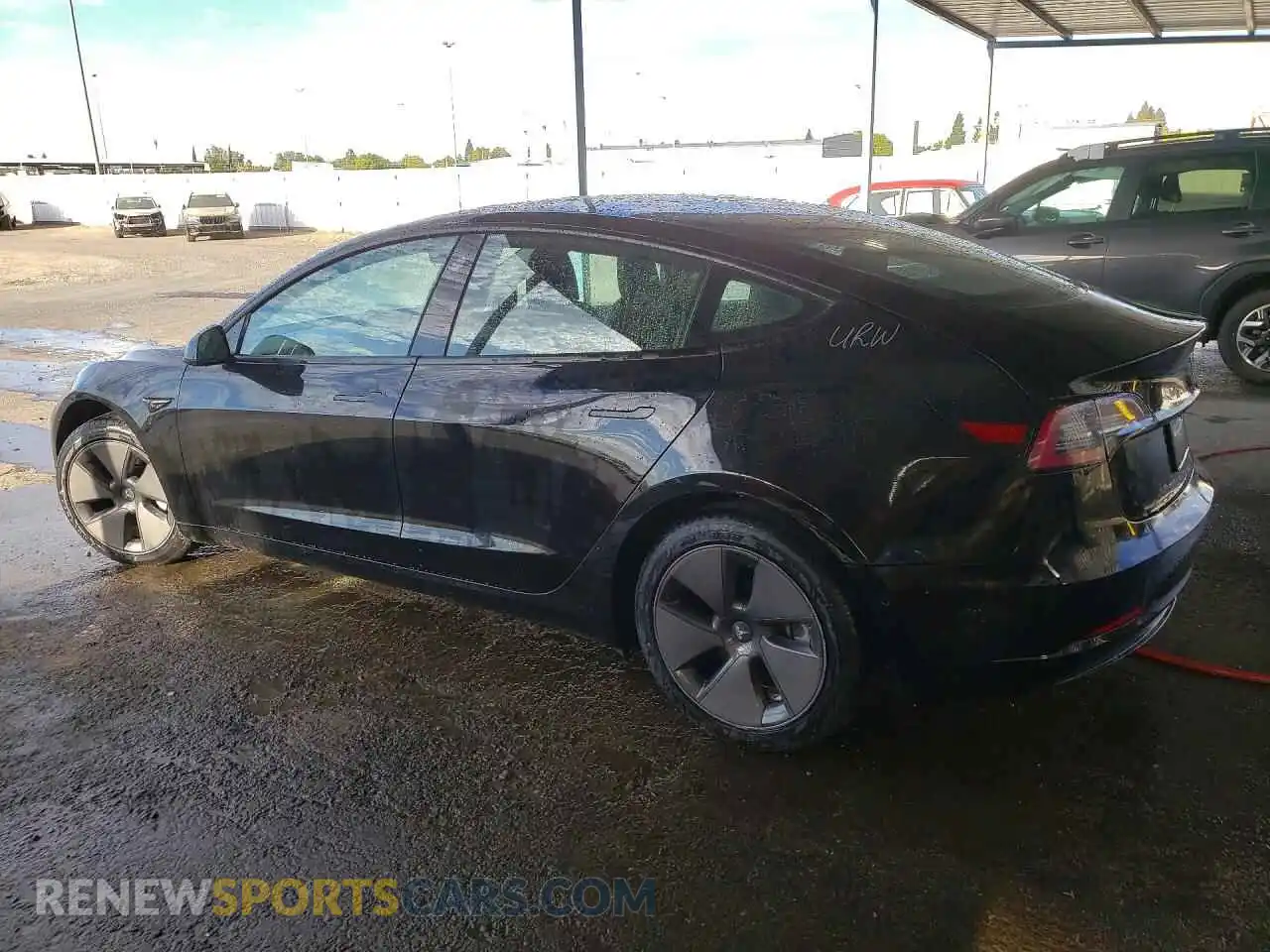 2 Photograph of a damaged car 5YJ3E1EB7NF259981 TESLA MODEL 3 2022