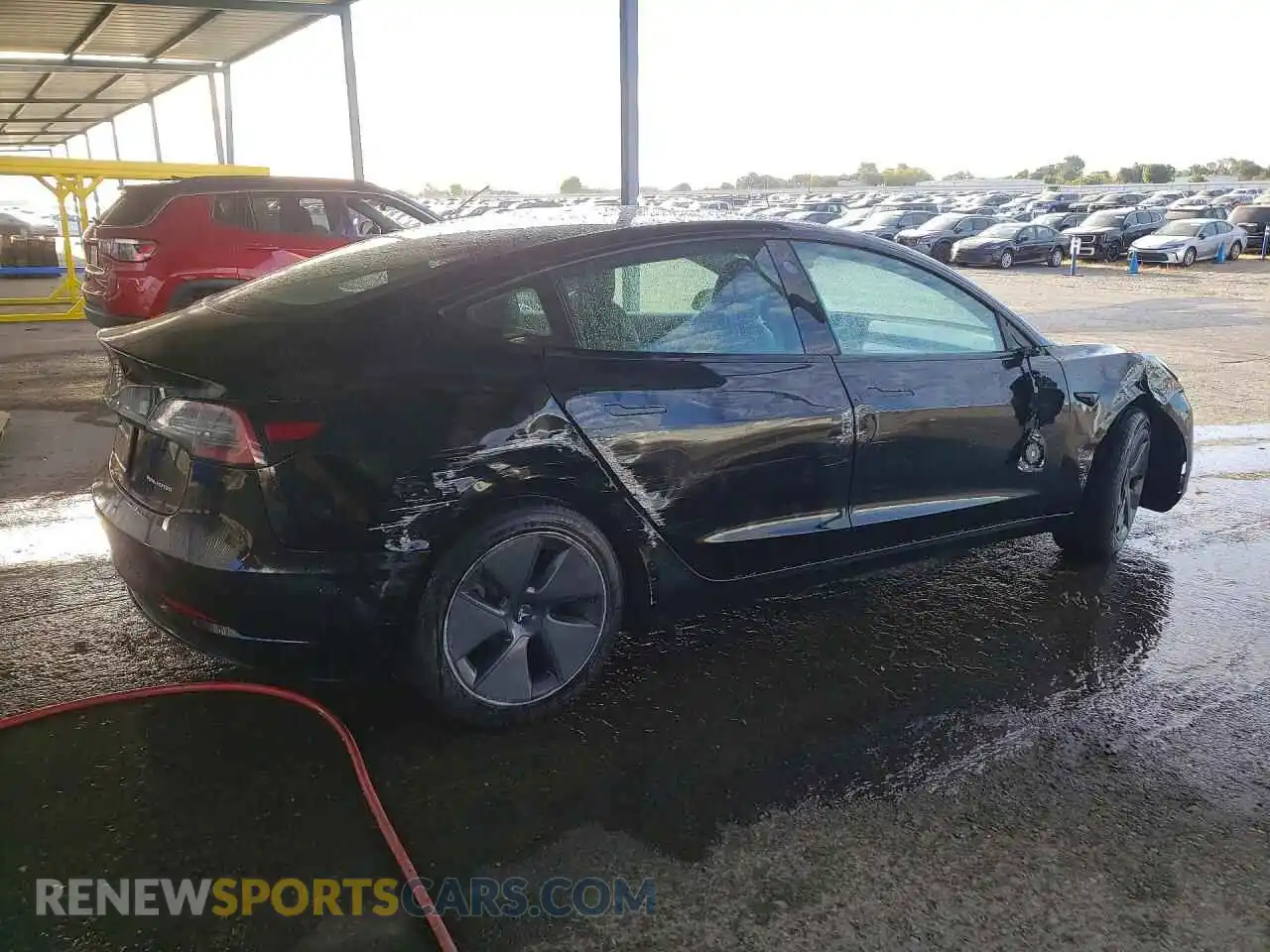3 Photograph of a damaged car 5YJ3E1EB7NF259981 TESLA MODEL 3 2022