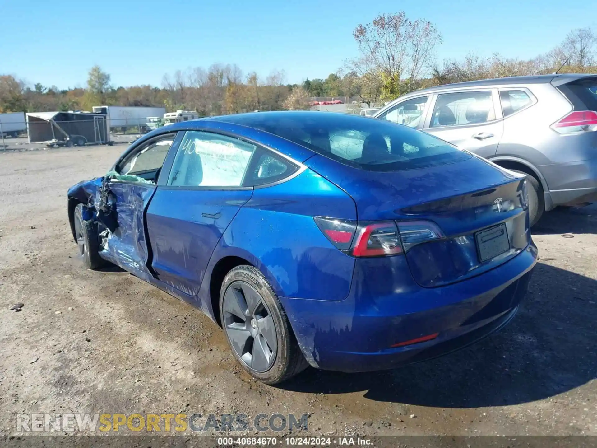3 Photograph of a damaged car 5YJ3E1EB7NF273413 TESLA MODEL 3 2022