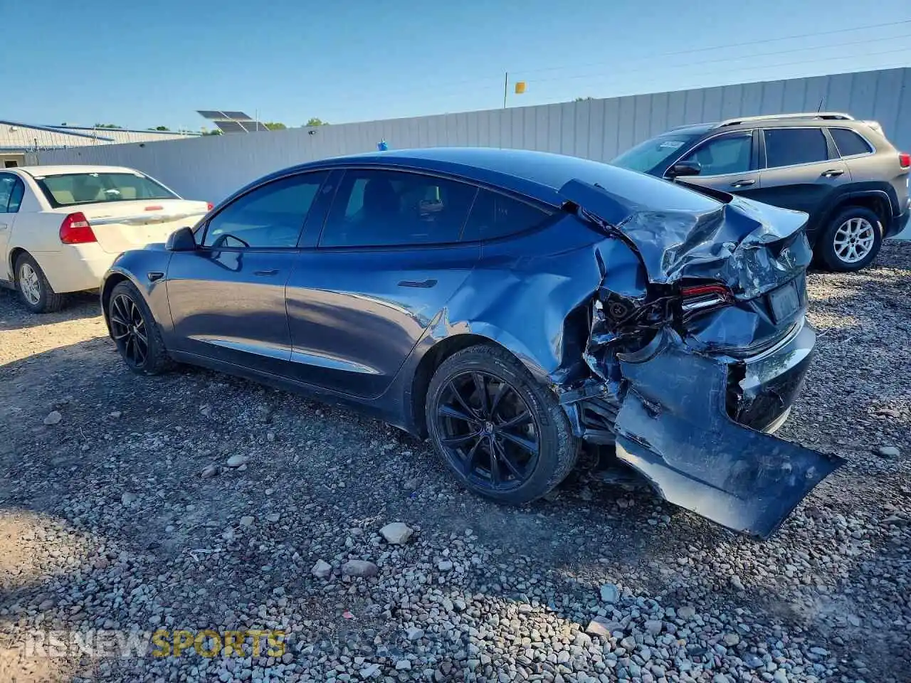 2 Photograph of a damaged car 5YJ3E1EB7NF329057 TESLA MODEL 3 2022