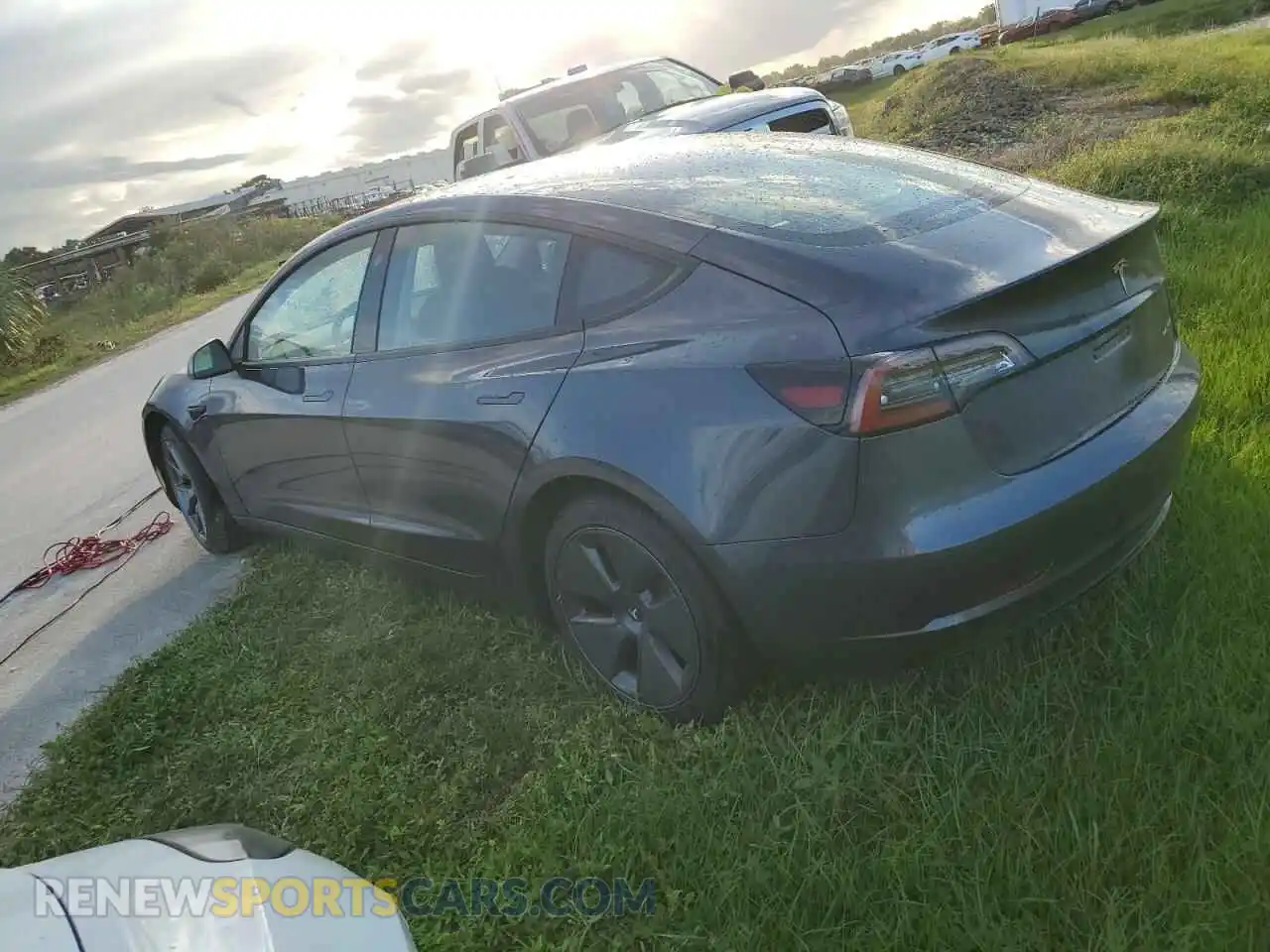 2 Photograph of a damaged car 5YJ3E1EB8NF104288 TESLA MODEL 3 2022
