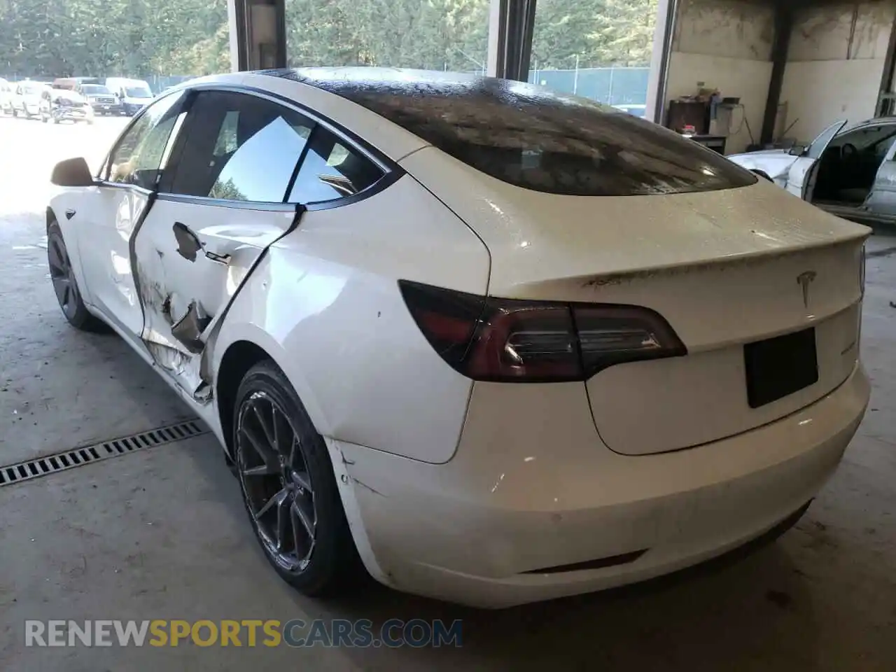 3 Photograph of a damaged car 5YJ3E1EB8NF106820 TESLA MODEL 3 2022