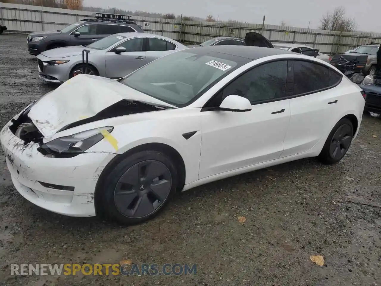 1 Photograph of a damaged car 5YJ3E1EB8NF127540 TESLA MODEL 3 2022