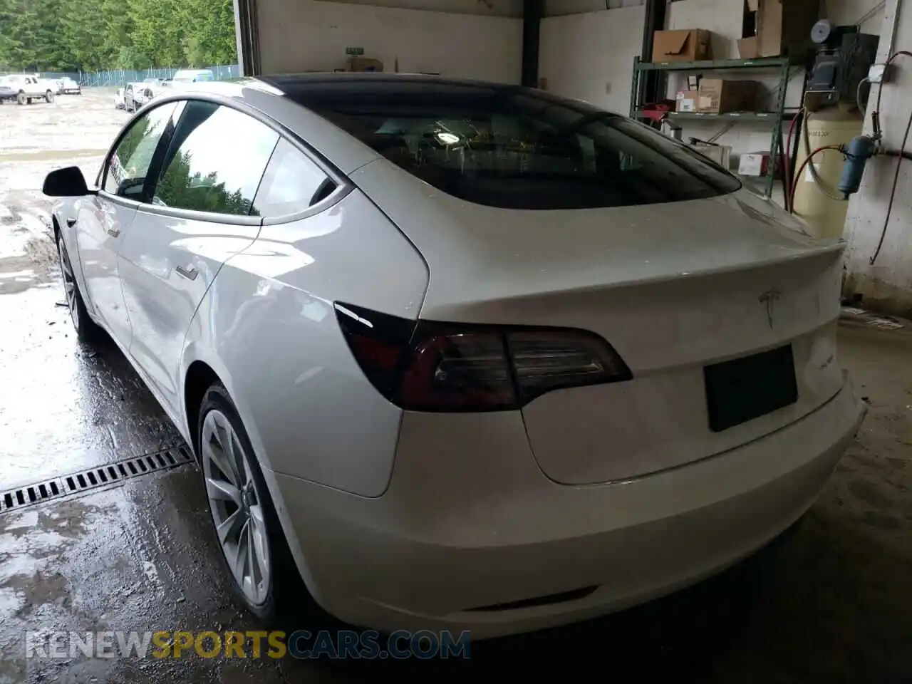 3 Photograph of a damaged car 5YJ3E1EB8NF128140 TESLA MODEL 3 2022