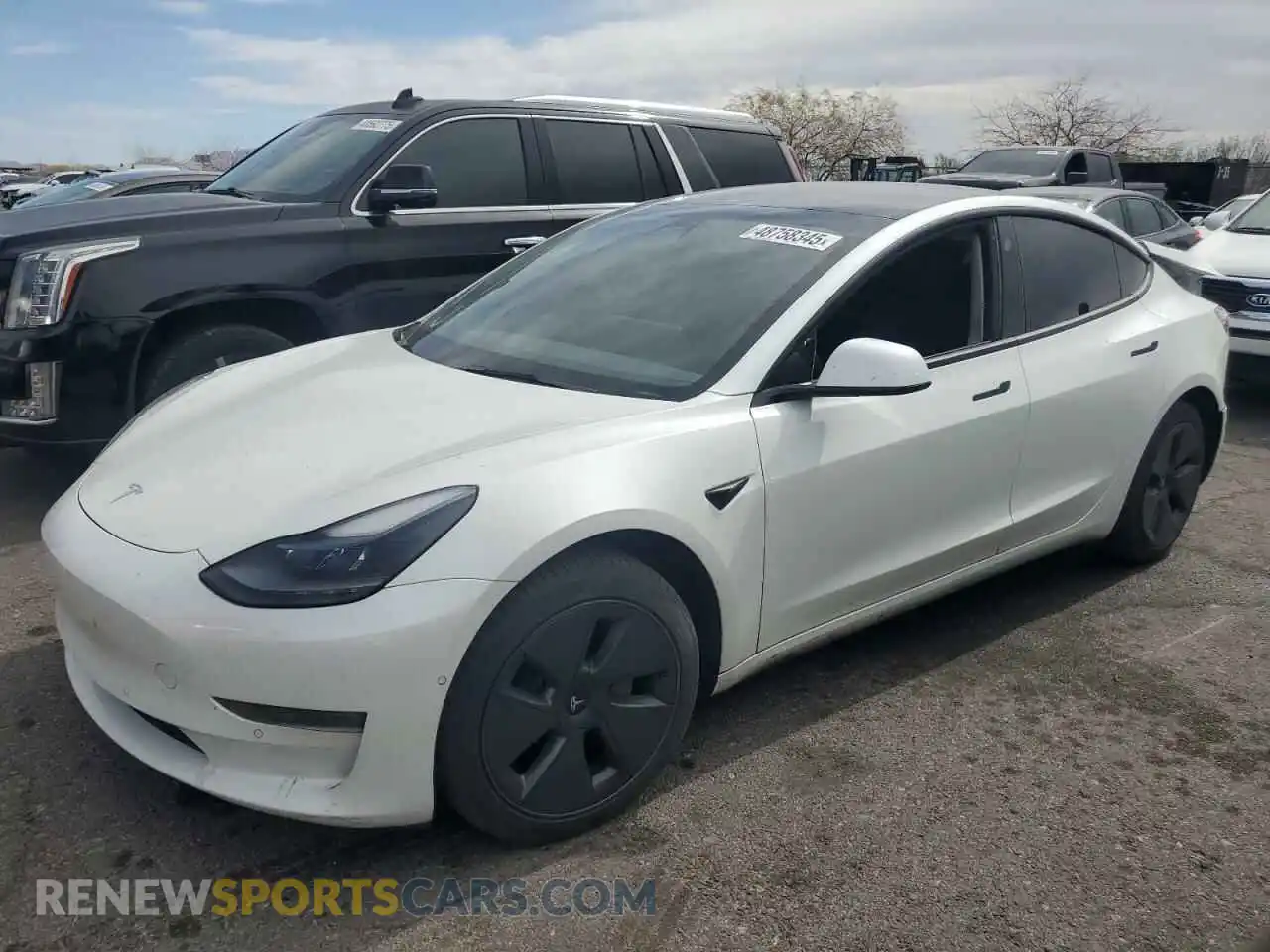 1 Photograph of a damaged car 5YJ3E1EB8NF169819 TESLA MODEL 3 2022
