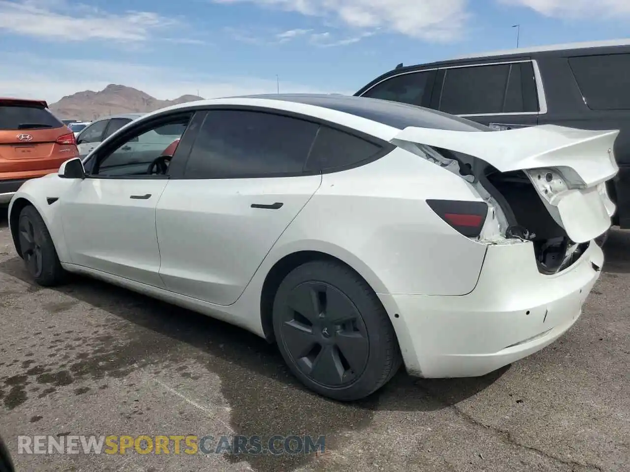 2 Photograph of a damaged car 5YJ3E1EB8NF169819 TESLA MODEL 3 2022
