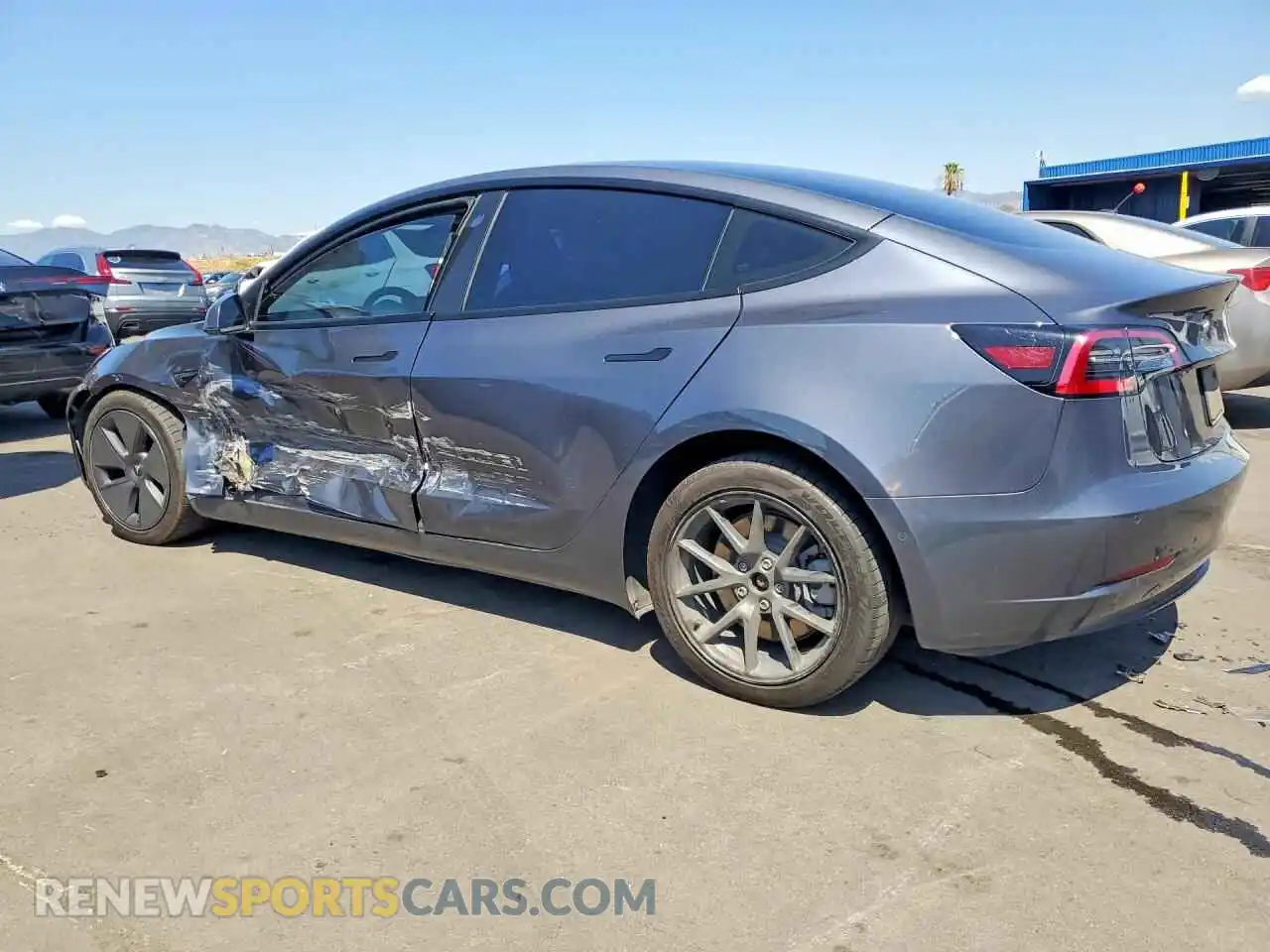 2 fotografías del automóvil dañado 5YJ3E1EB8NF180268 TESLA MODEL 3 2022
