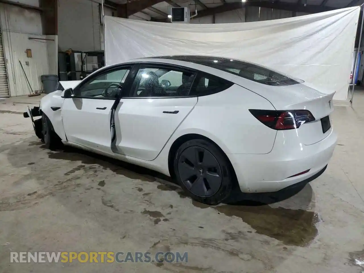 2 Photograph of a damaged car 5YJ3E1EB8NF192713 TESLA MODEL 3 2022