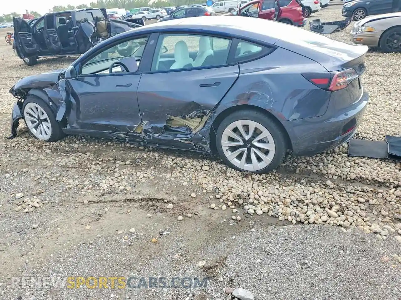 2 Photograph of a damaged car 5YJ3E1EB8NF194235 TESLA MODEL 3 2022