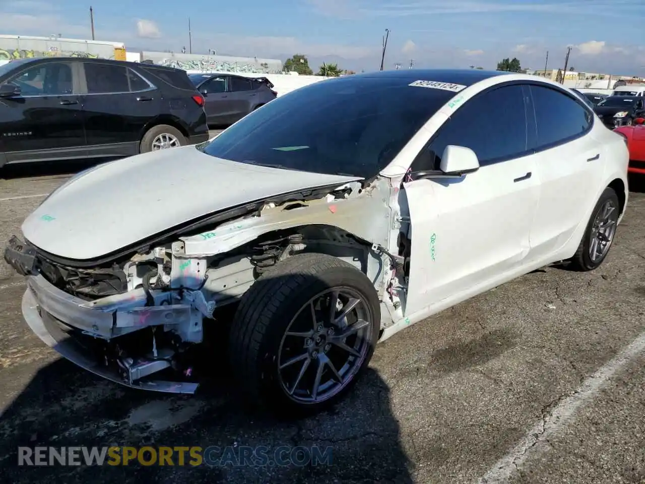 1 Photograph of a damaged car 5YJ3E1EB8NF203399 TESLA MODEL 3 2022