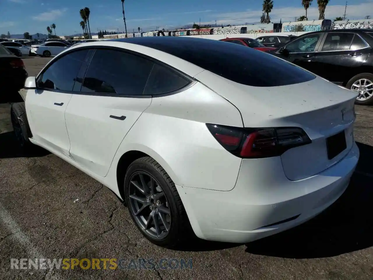 2 Photograph of a damaged car 5YJ3E1EB8NF203399 TESLA MODEL 3 2022