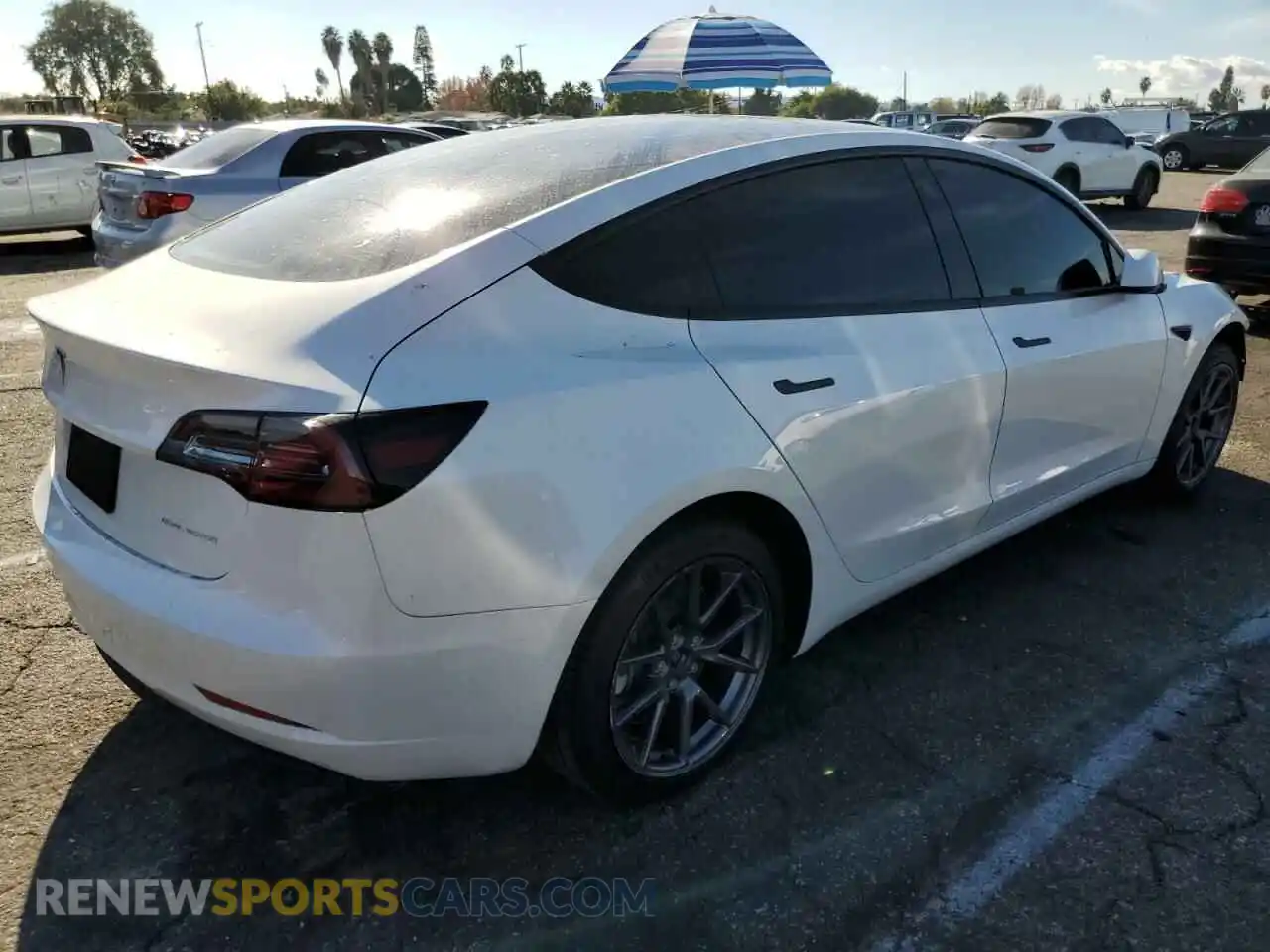 3 Photograph of a damaged car 5YJ3E1EB8NF203399 TESLA MODEL 3 2022