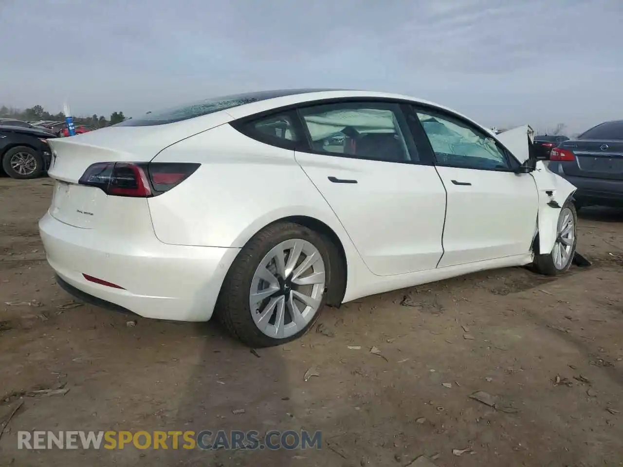 3 Photograph of a damaged car 5YJ3E1EB8NF255423 TESLA MODEL 3 2022