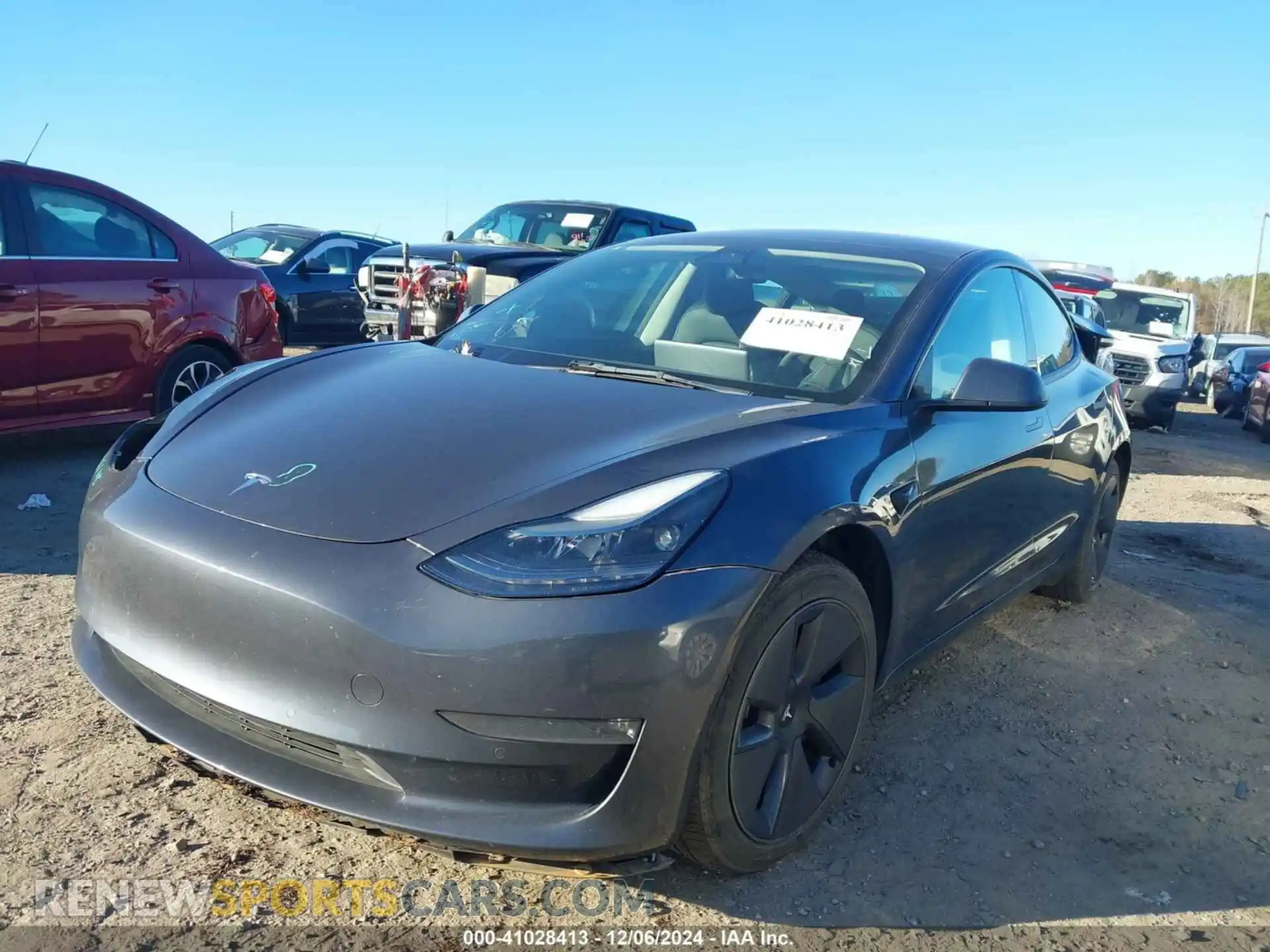 2 Photograph of a damaged car 5YJ3E1EB8NF255597 TESLA MODEL 3 2022