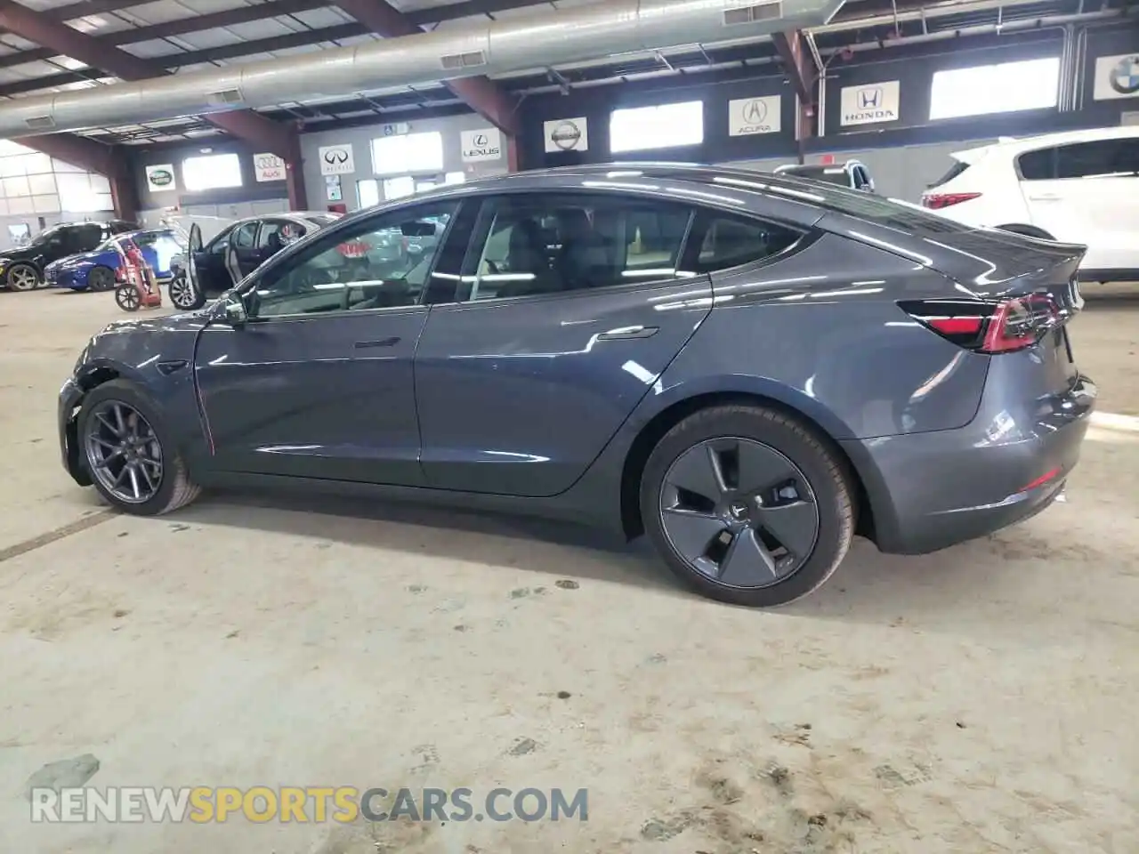 2 Photograph of a damaged car 5YJ3E1EB8NF261433 TESLA MODEL 3 2022