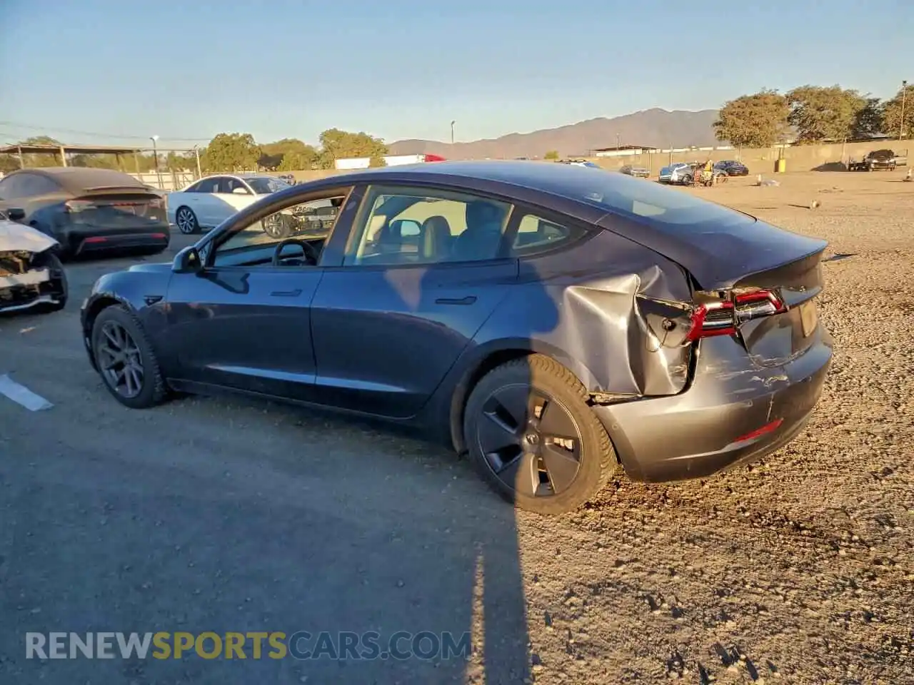 2 Photograph of a damaged car 5YJ3E1EB8NF276806 TESLA MODEL 3 2022