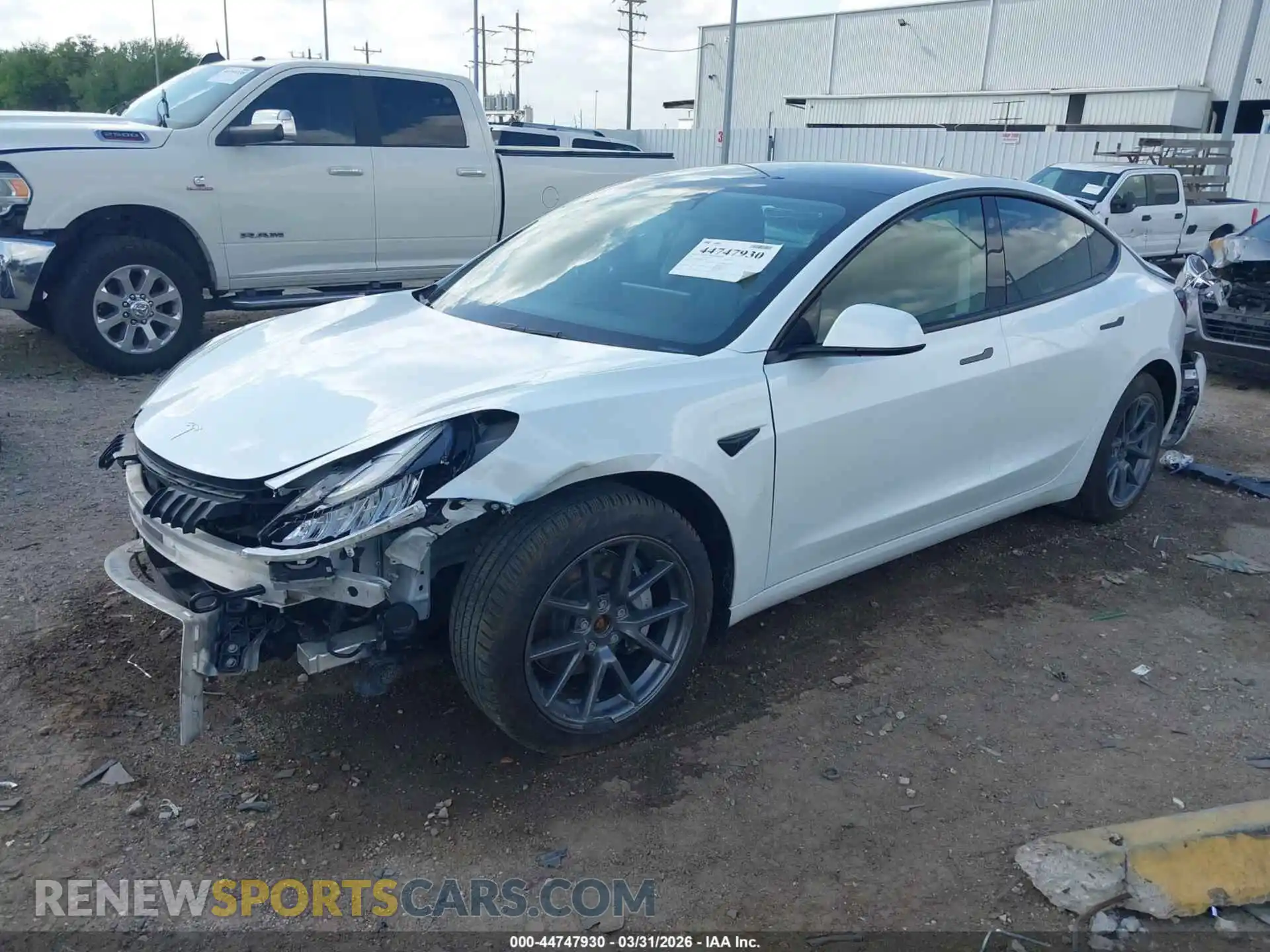 2 fotografías del automóvil dañado 5YJ3E1EB8NF276904 TESLA MODEL 3 2022