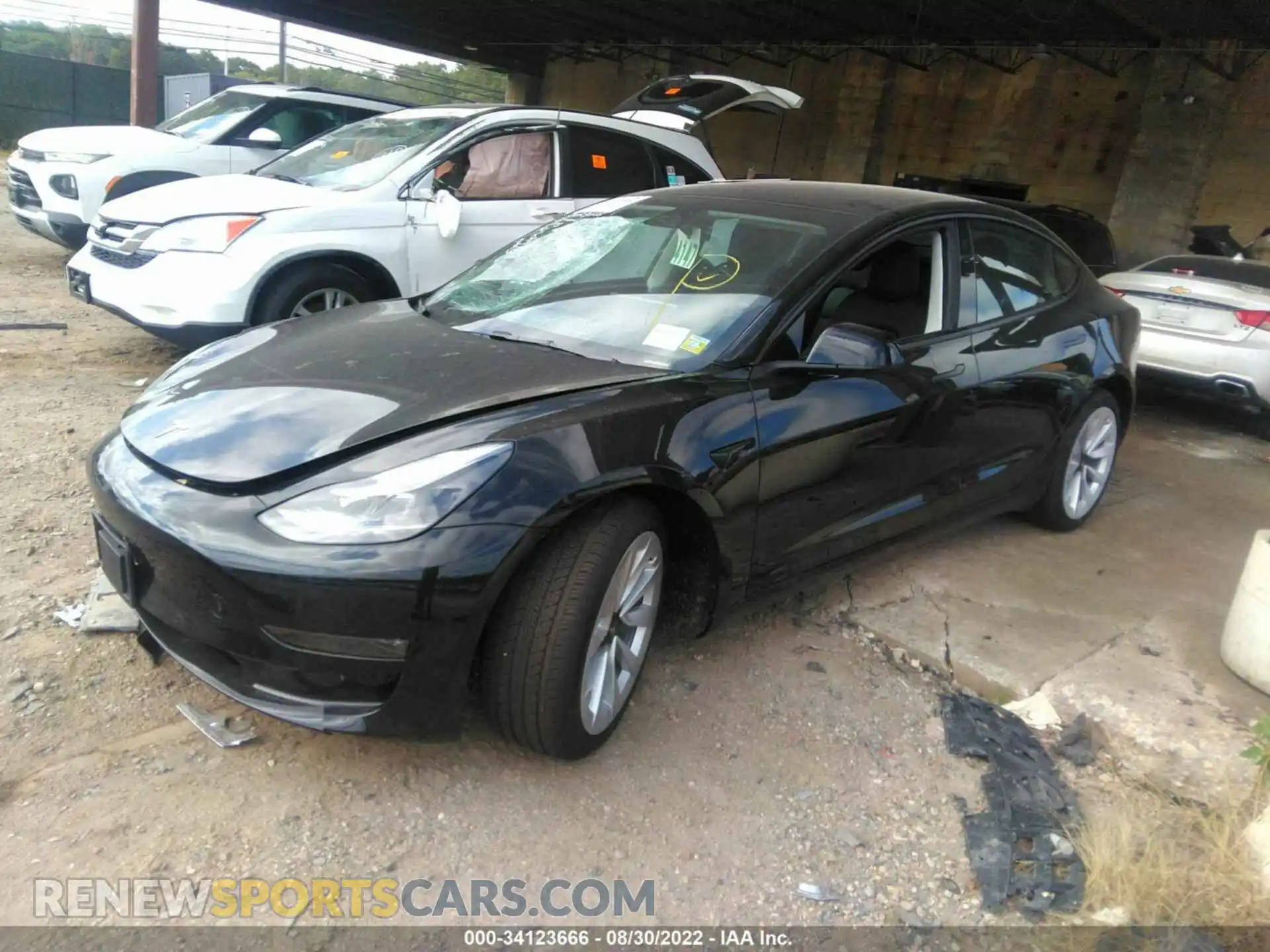 2 Photograph of a damaged car 5YJ3E1EB8NF311425 TESLA MODEL 3 2022