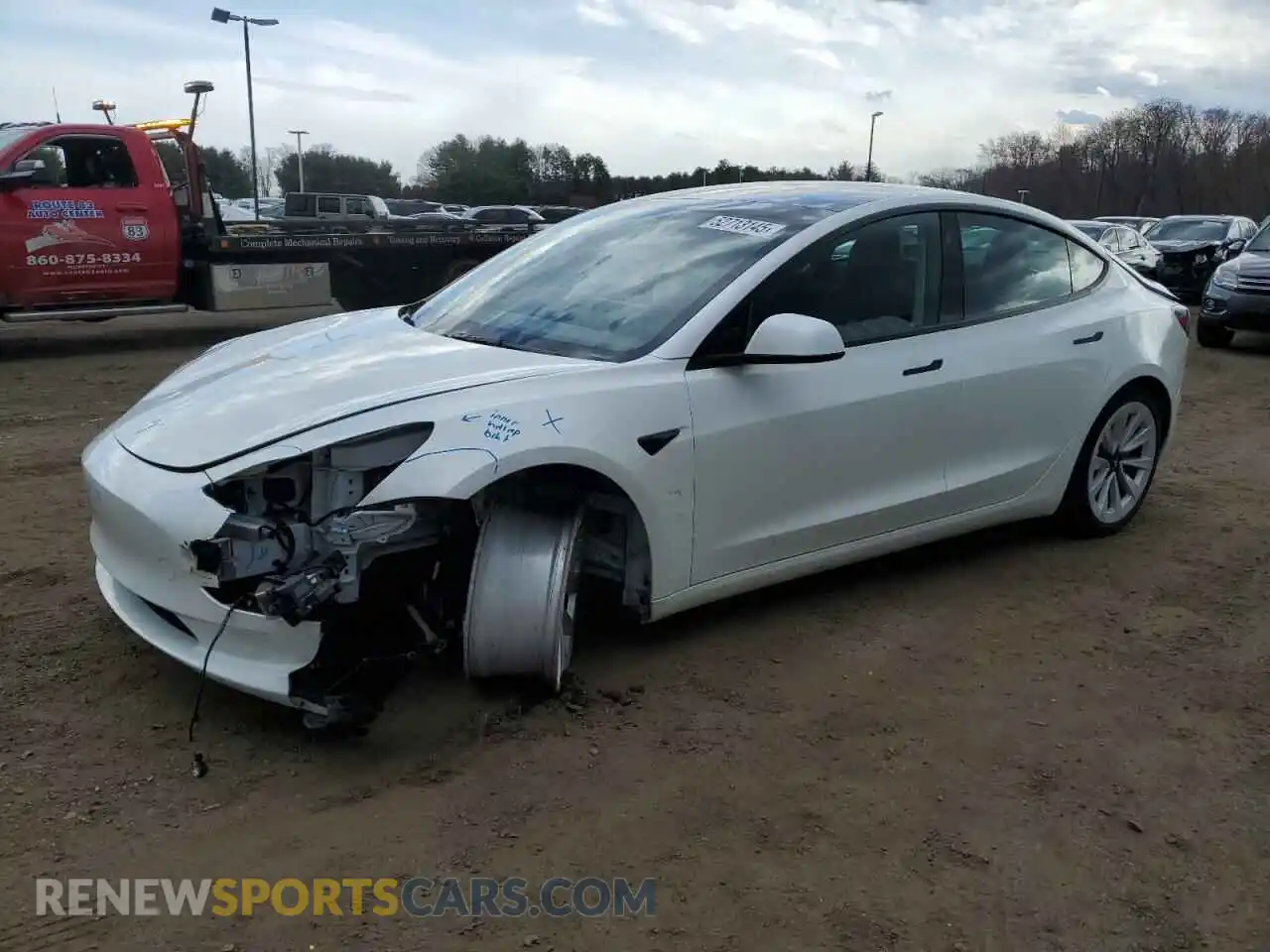 1 Photograph of a damaged car 5YJ3E1EB8NF338169 TESLA MODEL 3 2022